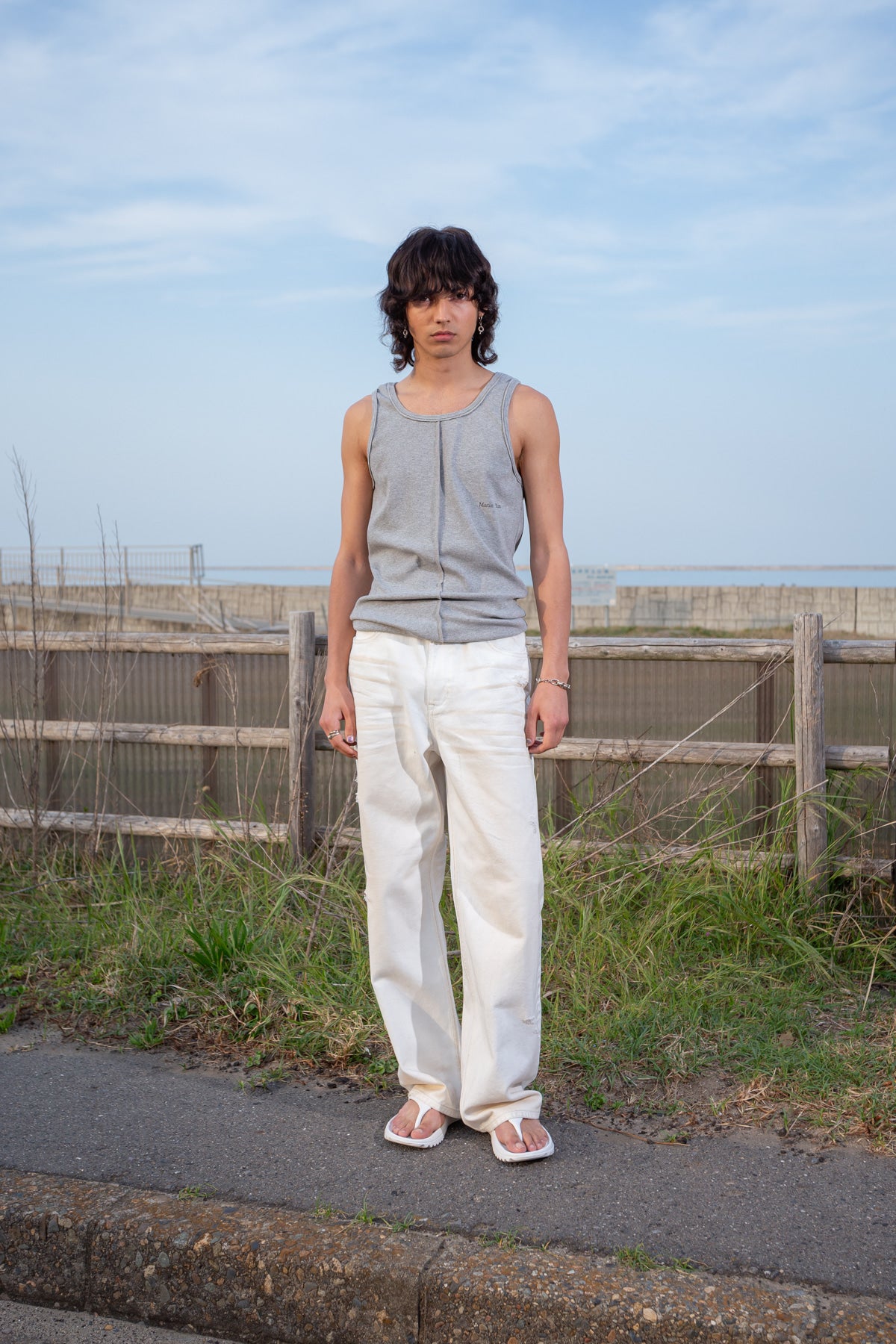 matinkim EMBO WASHED DENIM PANTS FOR MEN IN IVORY