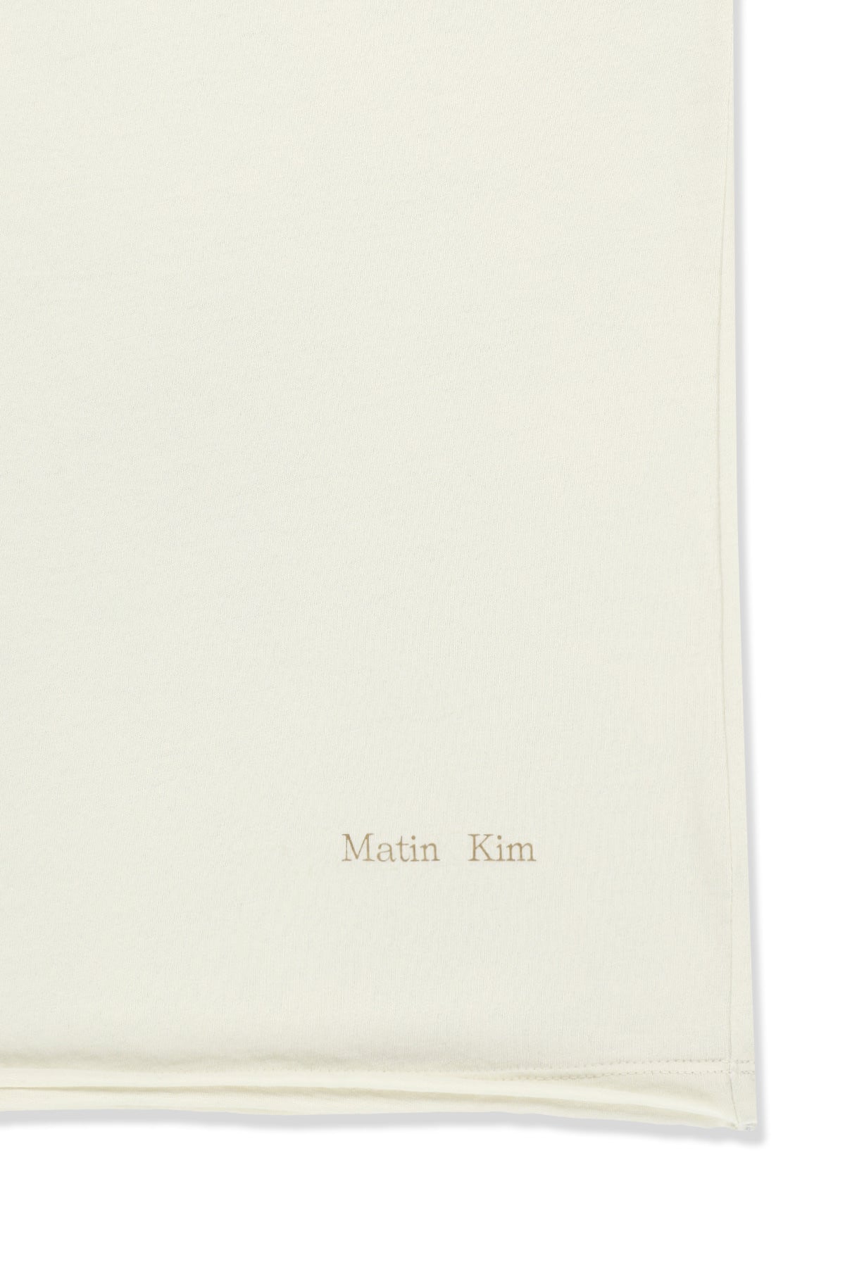 matinkim TWIST SHOULDER SLEEVELESS TOP IN CREAM