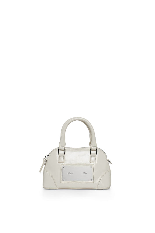 matinkim CURVE ZIP MINI BAG IN LIGHT GREY