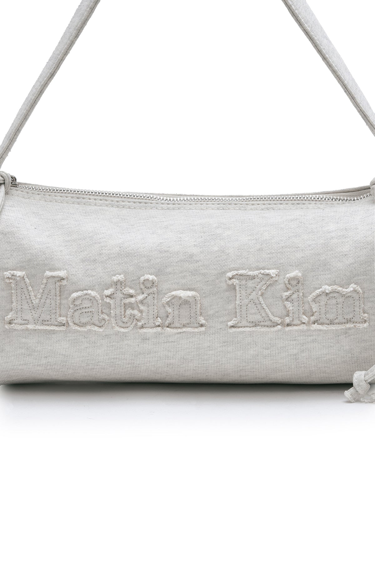 matinkim APPLIQUE LOGO JERSEY DUFFLE BAG IN LIGHT BEIGE