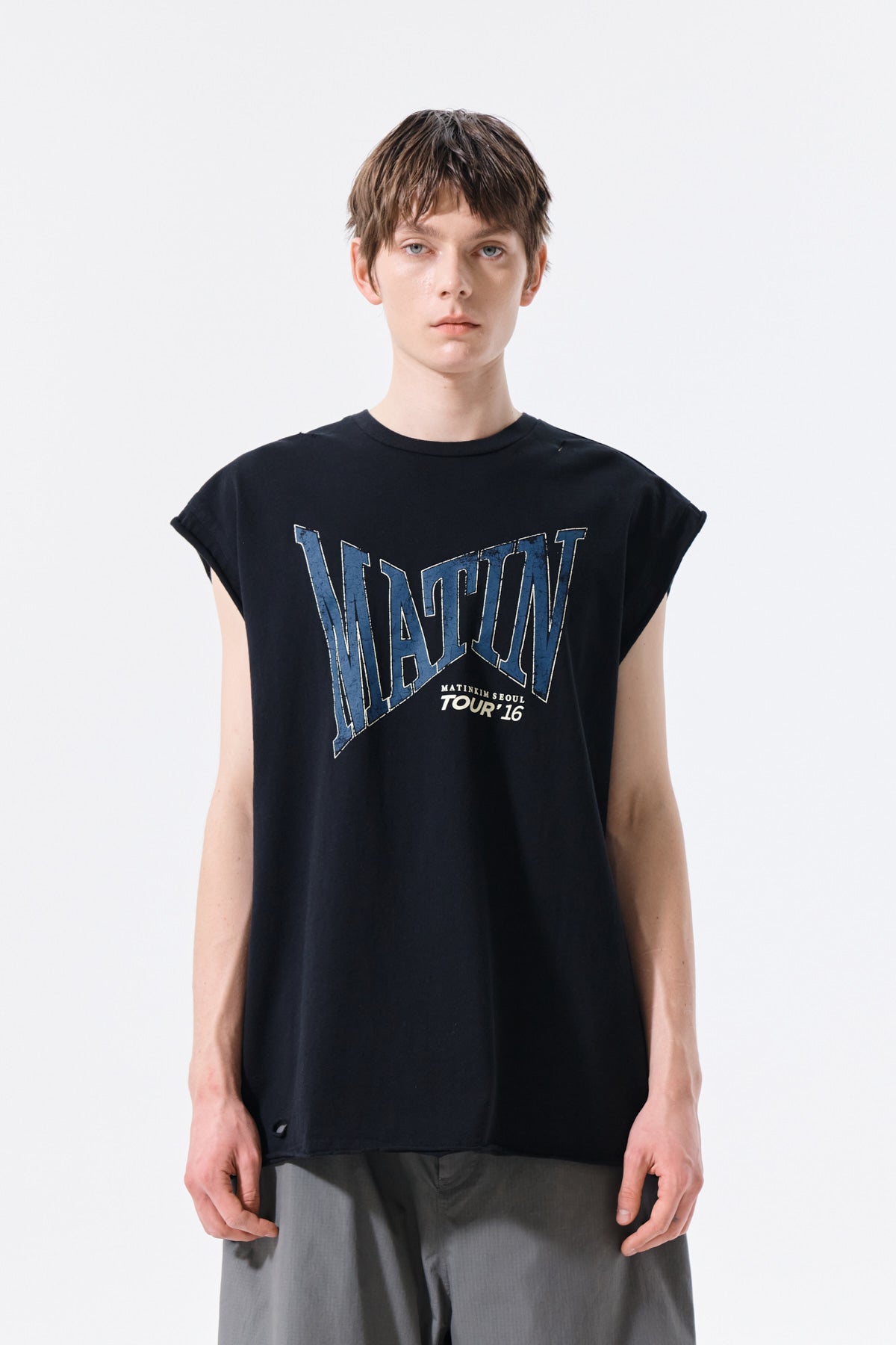matinkim RAW EDGE CUT OUT SLEEVELESS TOP FOR MEN IN BLACK
