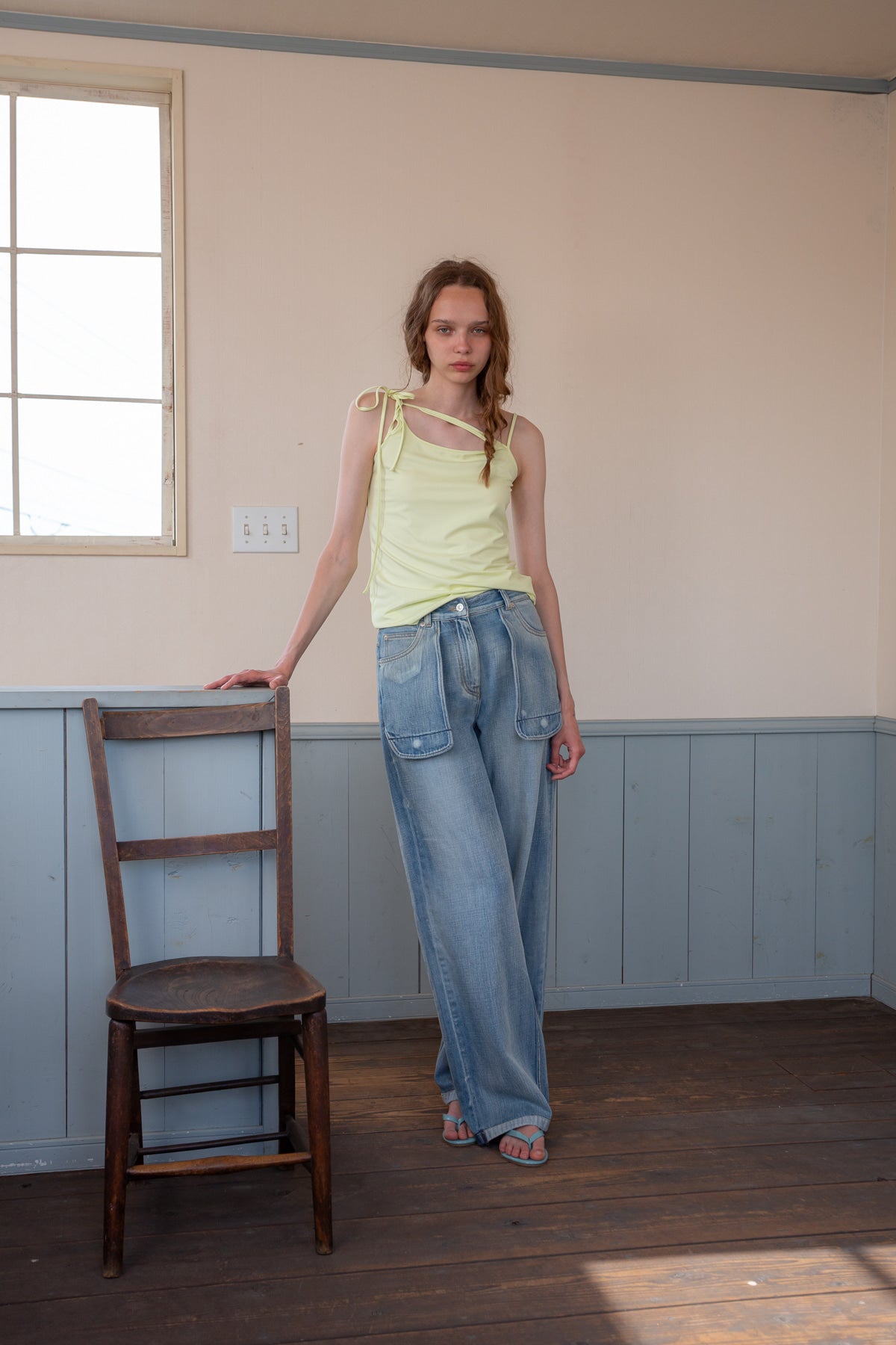 matinkim OUT POCKET WASHED DENIM PANTS IN LIGHT BLUE