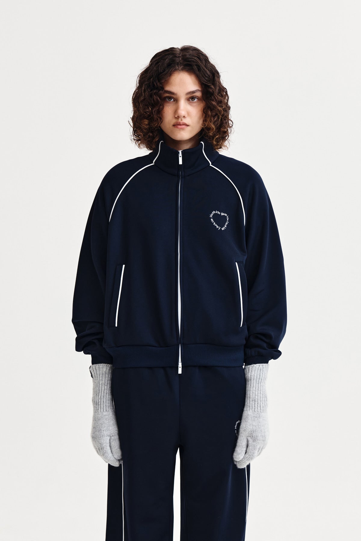 matinkim HEART LOGO TRACK JUMPER IN NAVY