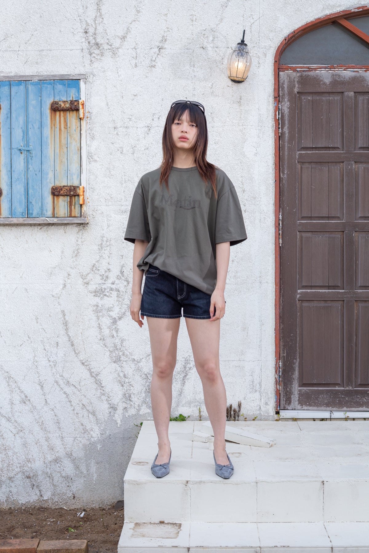 matinkim STITCH POINT DENIM SHORTS IN BLACK