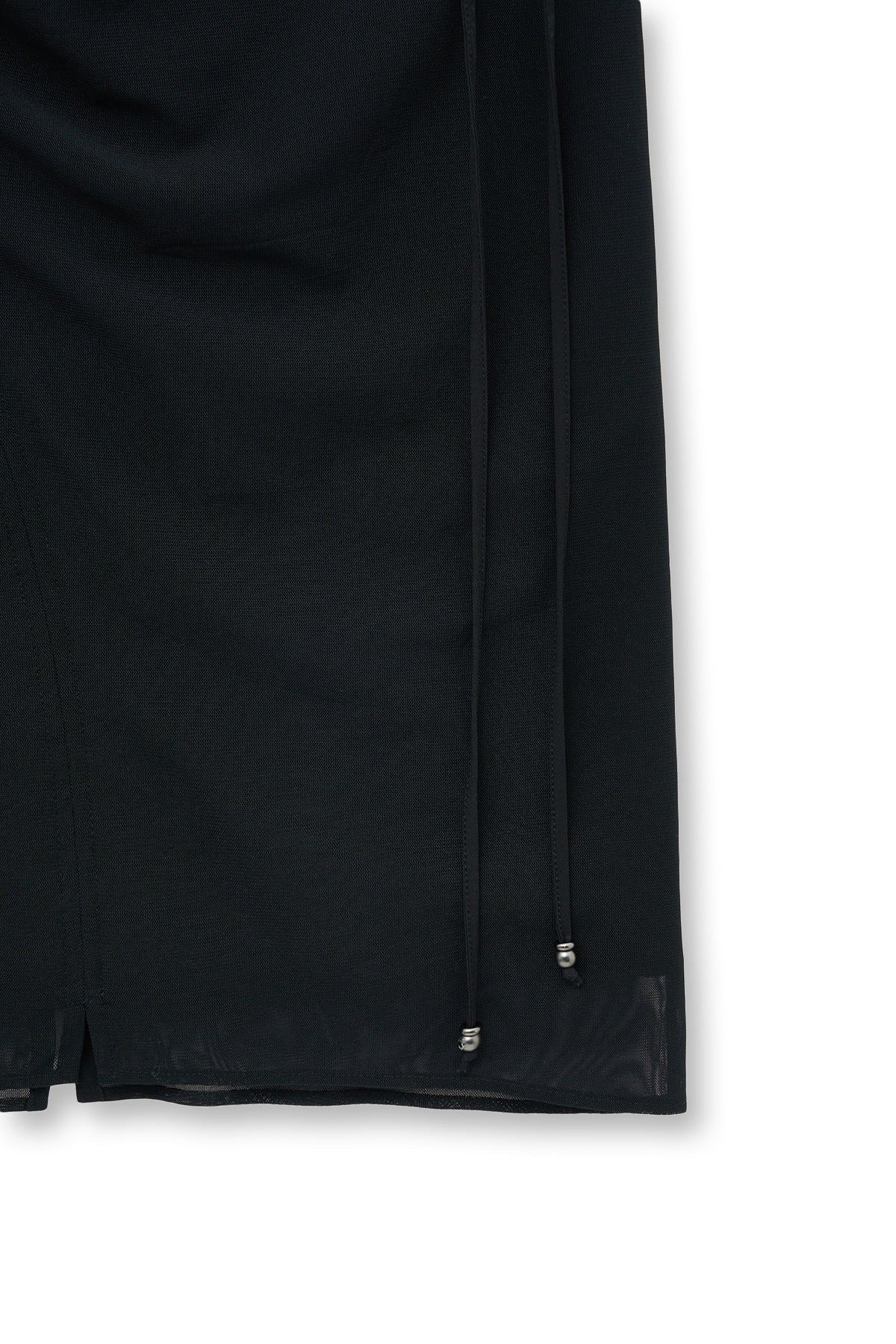 matinkim LAYERED STRING MIDI SKIRT IN BLACK
