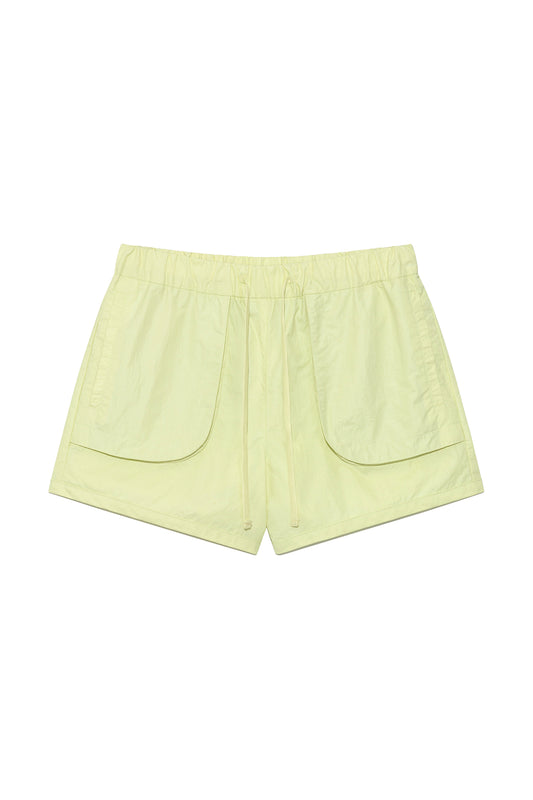 matinkim OUT POCKET NYLON BANDING SHORTS IN LIME