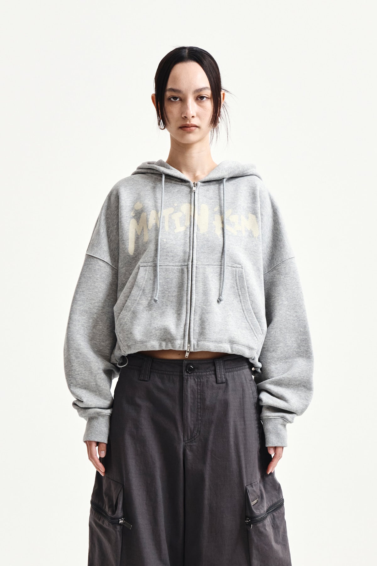 matinkim GRAFFITI LOGO CROP HOODY ZIP UP IN GREY