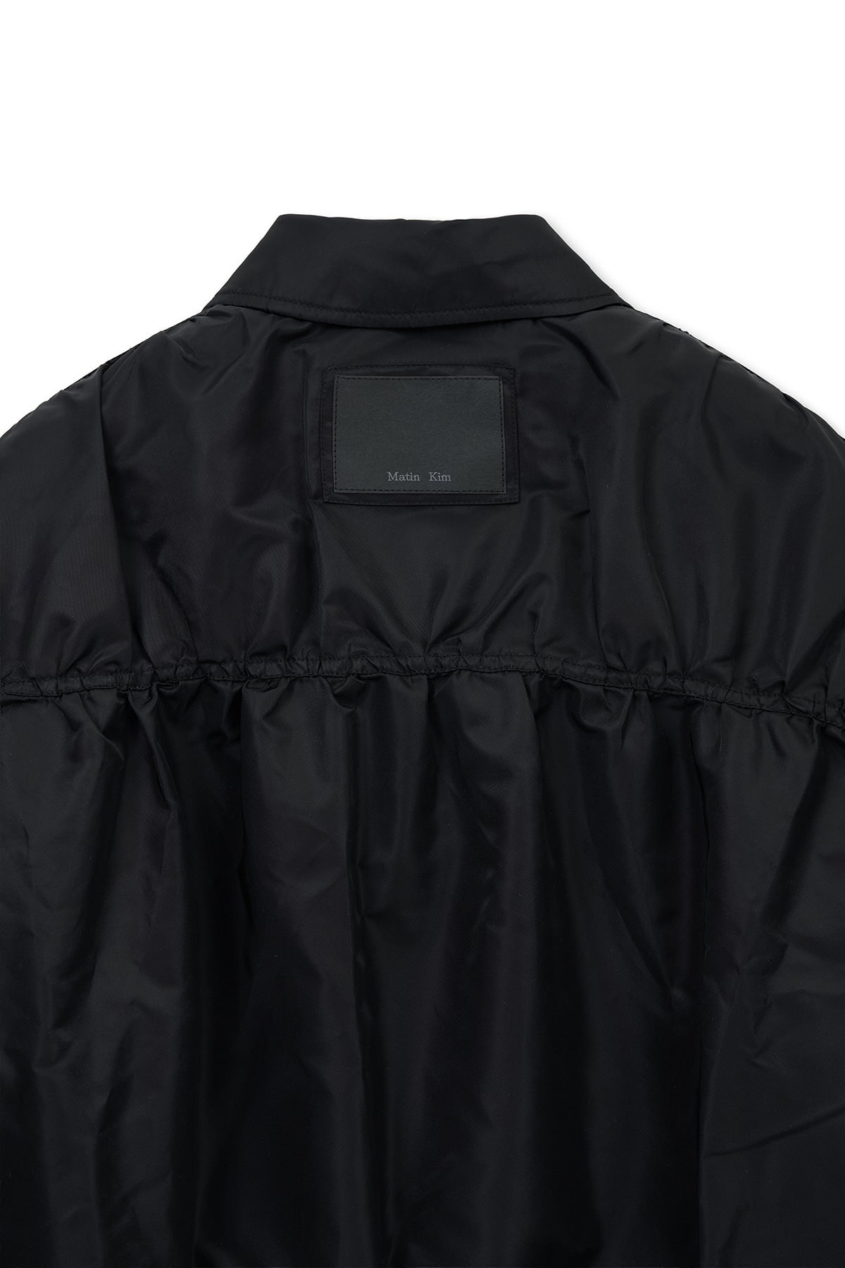 matinkim SMALL LOGO SHIRRING JUMPER IN BLACK