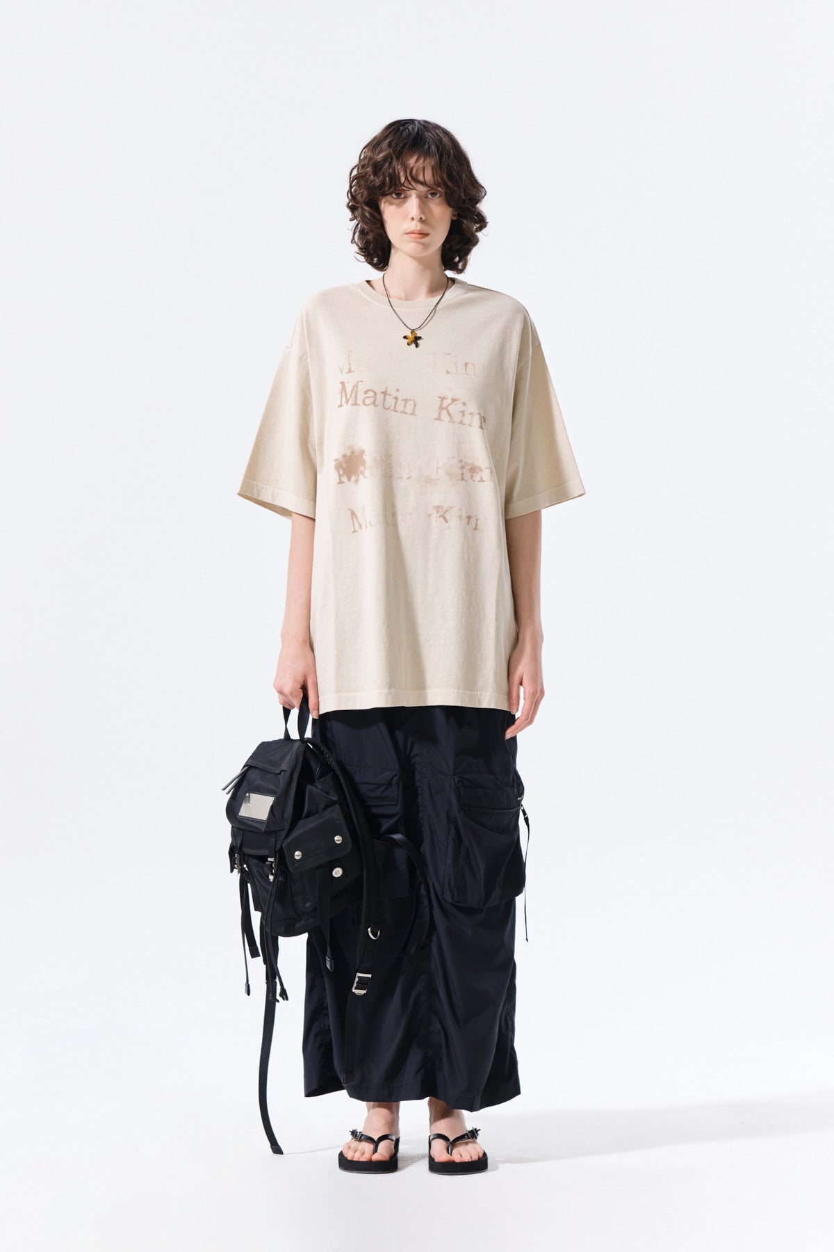 matinkim PATCH POCKET SHIRRING NYLON SKIRT IN BLACK