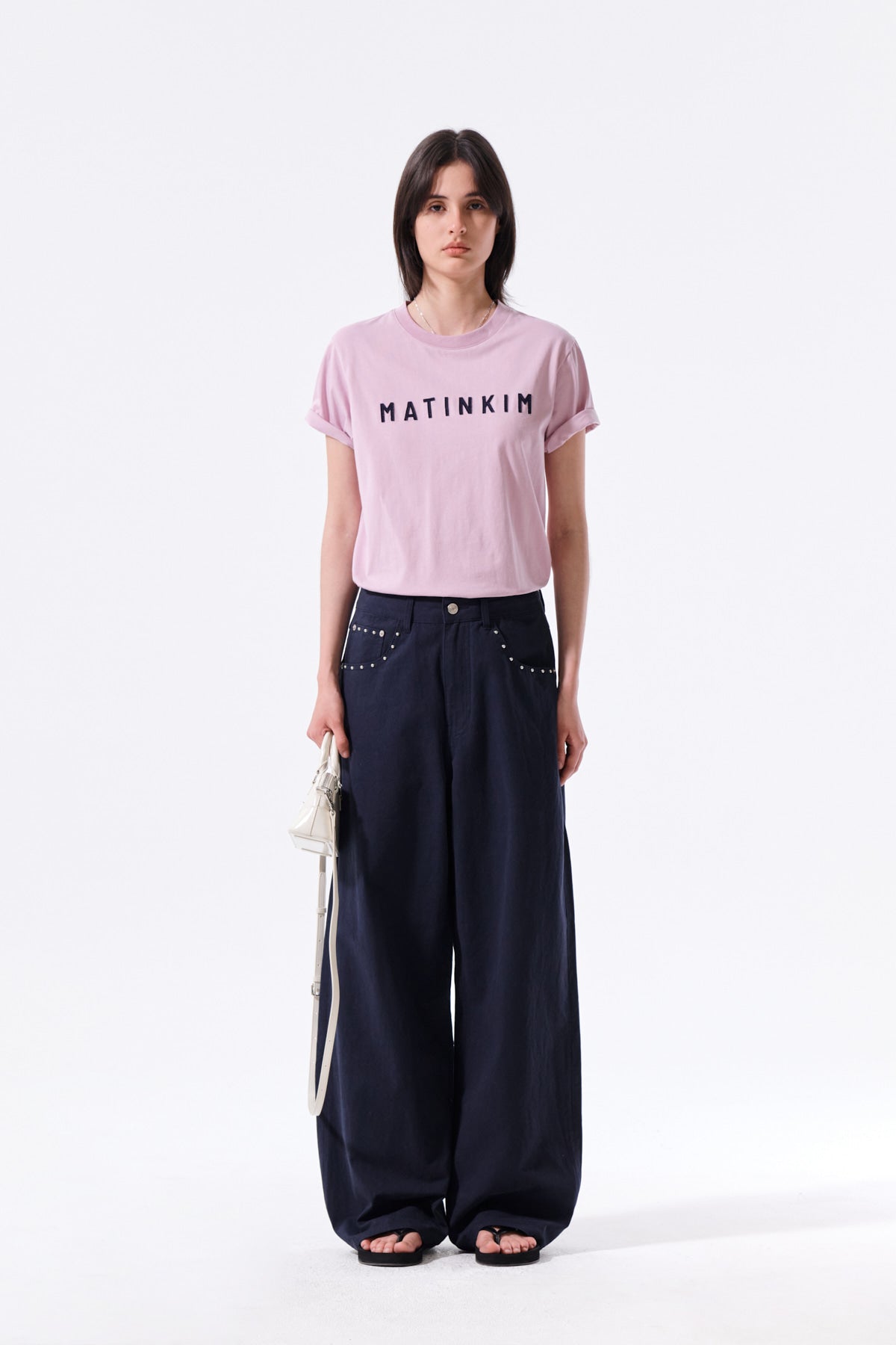 matinkim STUD POINT COLOR DENIM PANTS IN NAVY