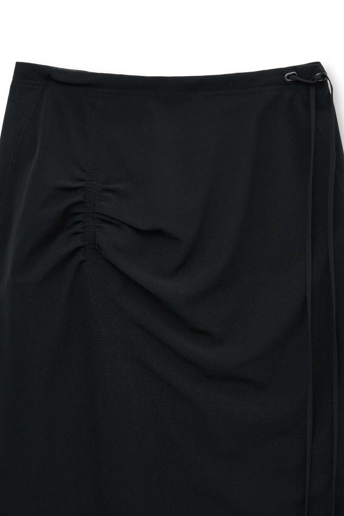 matinkim LAYERED STRING MIDI SKIRT IN BLACK