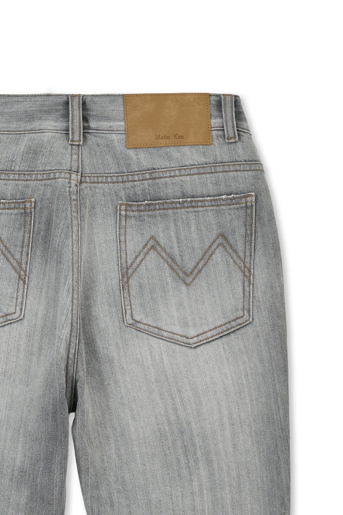 matinkim WASHED POINT BOOTS CUT DENIM PANTS IN GREY