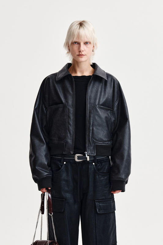 matinkim FAUX LEATHER OUT POCKET JUMPER IN CHARCOAL