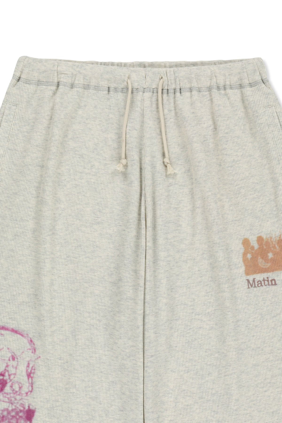 matinkim SKETCH GRAFFITI WAFFLE PANTS IN LIGHT BEIGE