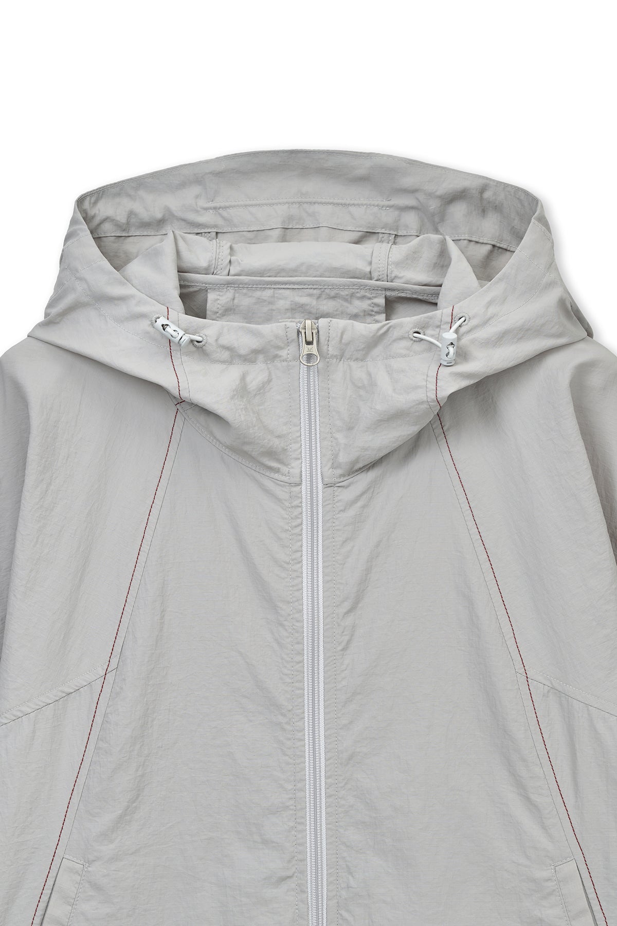 matinkim CROPPED BACK LOGO HOODY WIND BREAKER IN LIGHT BEIGE