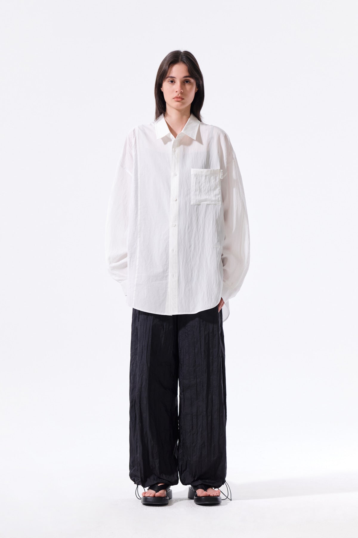 matinkim NYLON CRINKLE WIDE PANTS IN BLACK