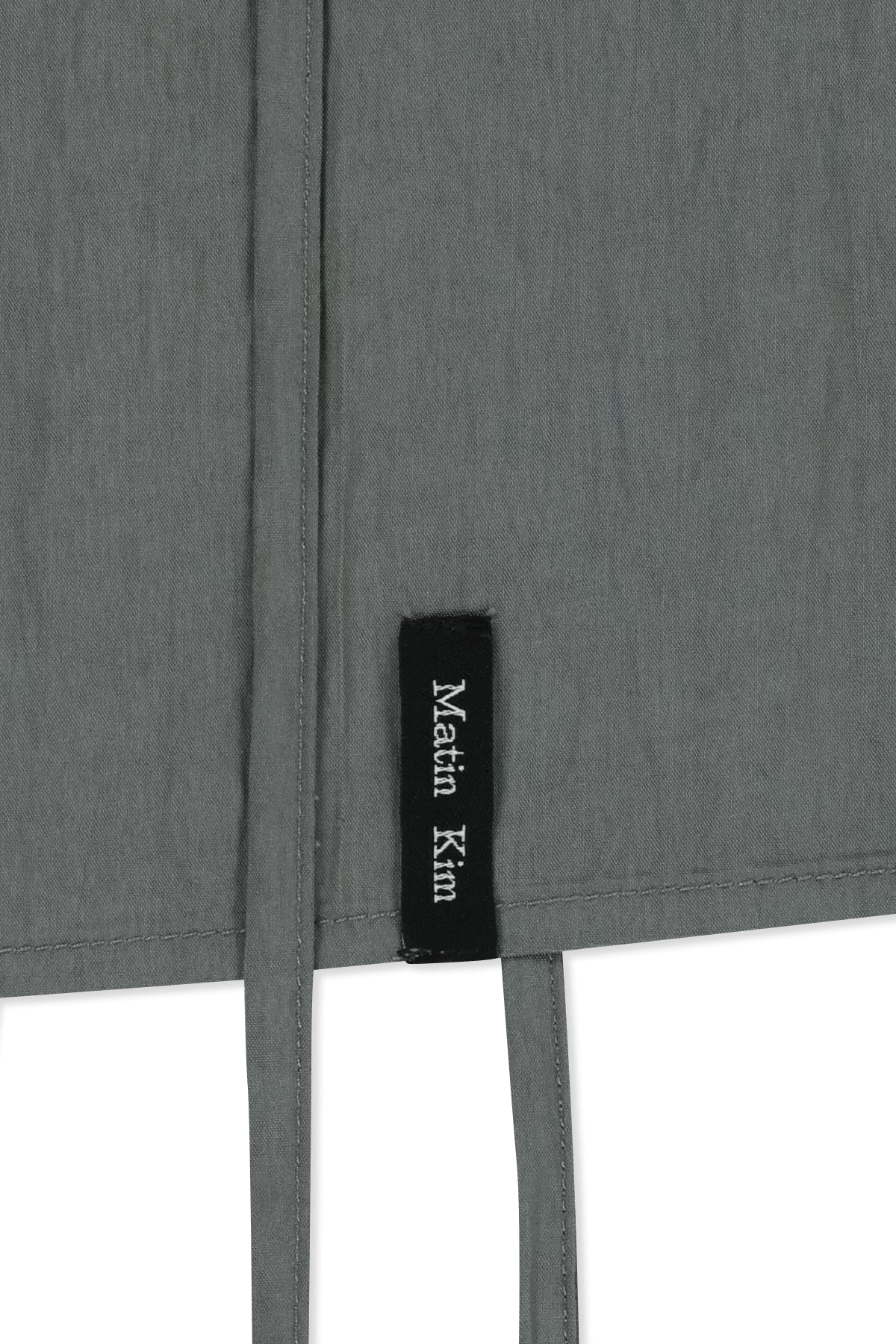 matinkim BUTTON SLEEVELESS BLOUSE IN GREY