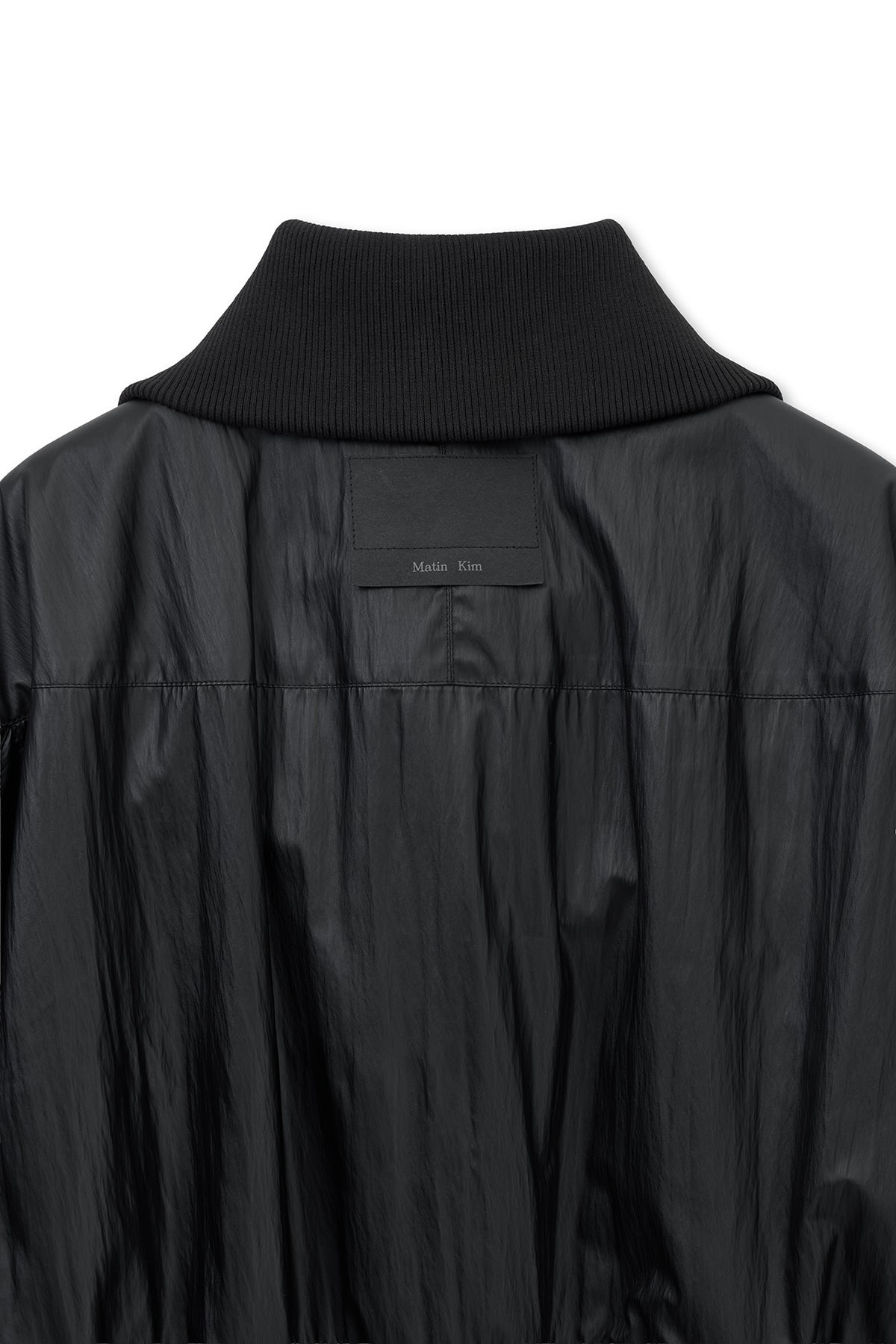 matinkim SHINE CRINKLE ZIP BLOUSON IN BLACK