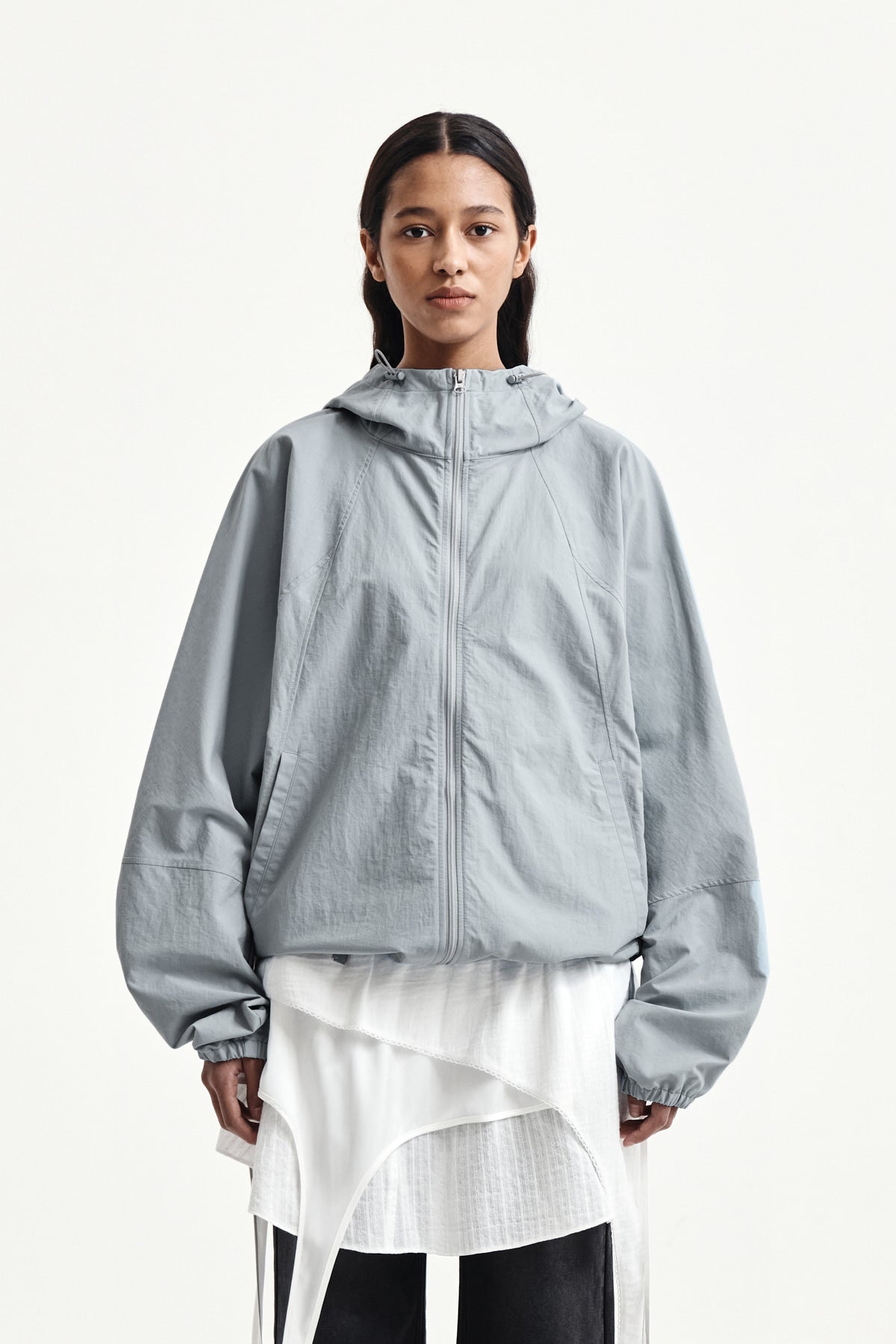 matinkim BACK LOGO HOODY WIND BREAKER IN LIGHT GREY
