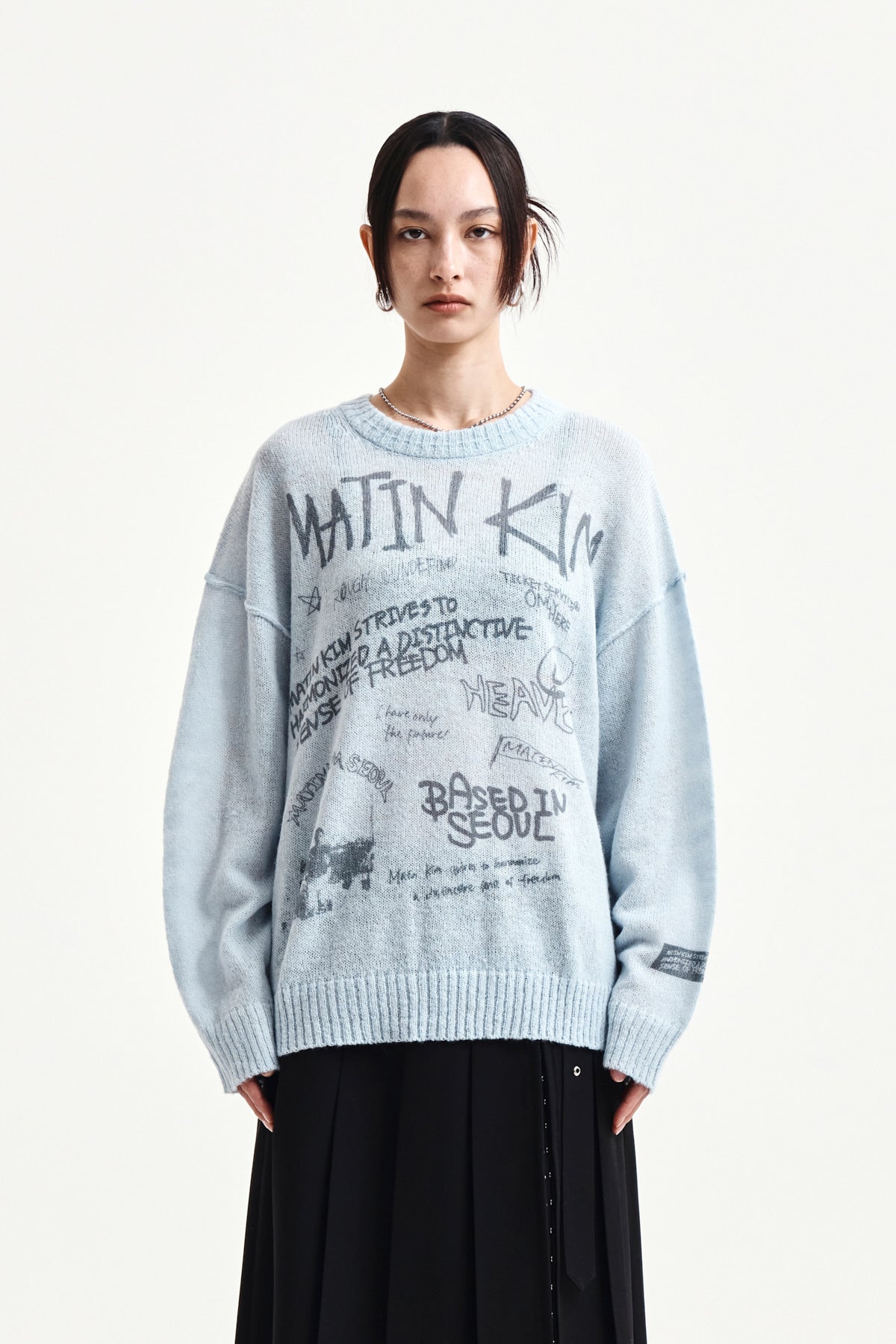 matinkim GRAFFITI ARTWORK KNIT PULLOVER IN LIGHT BLUE
