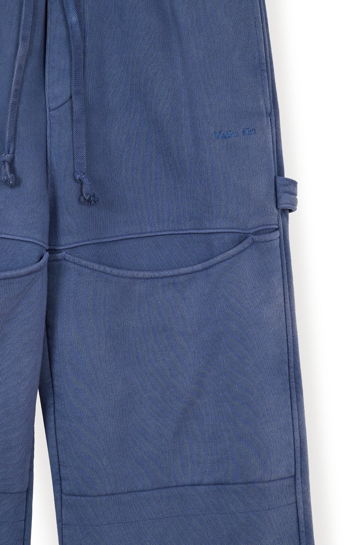 matinkim CUT OUT WASHED SWEATPANTS FOR MEN IN BLUE