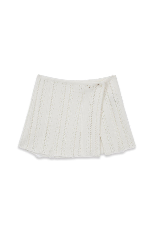 matinkim PUNCHING WRAP MINI SKIRT IN IVORY