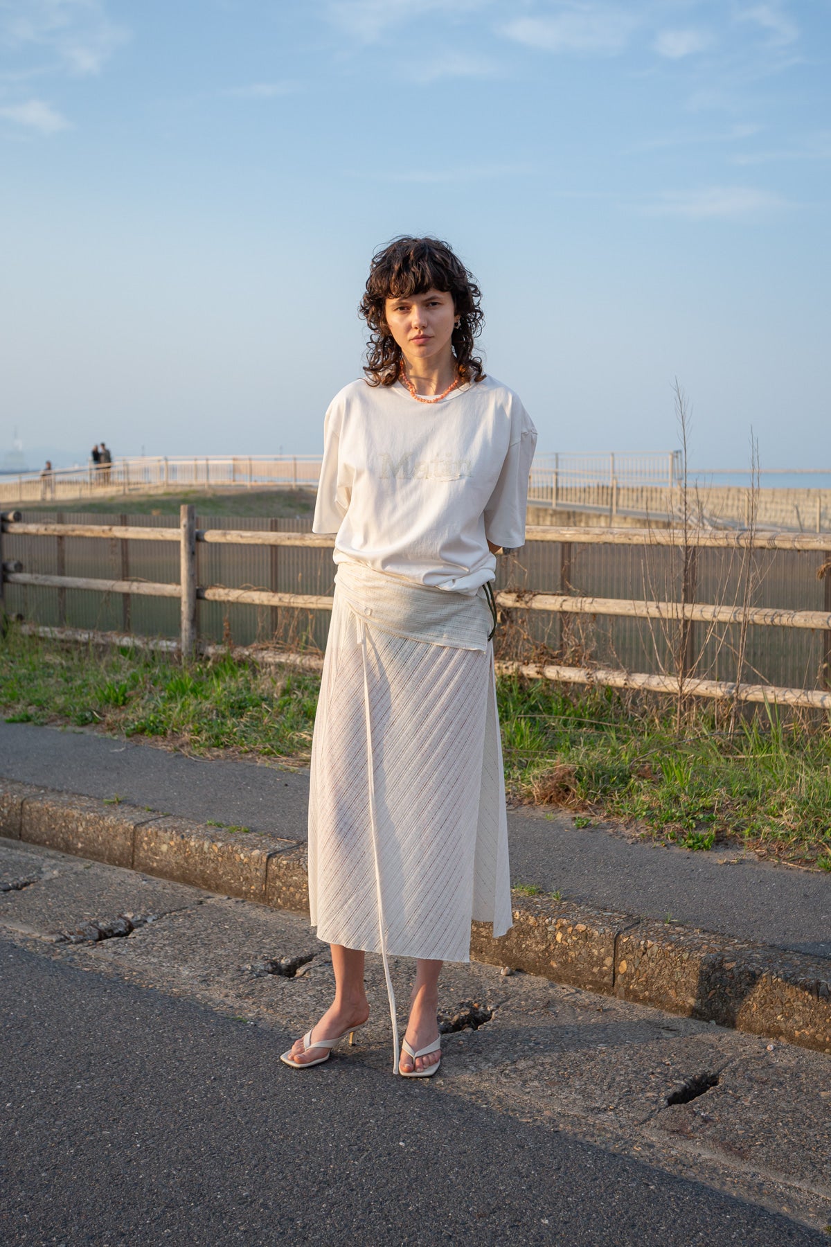 matinkim FOLDOVER LAYERED MAXI WRAP SKIRT IN IVORY