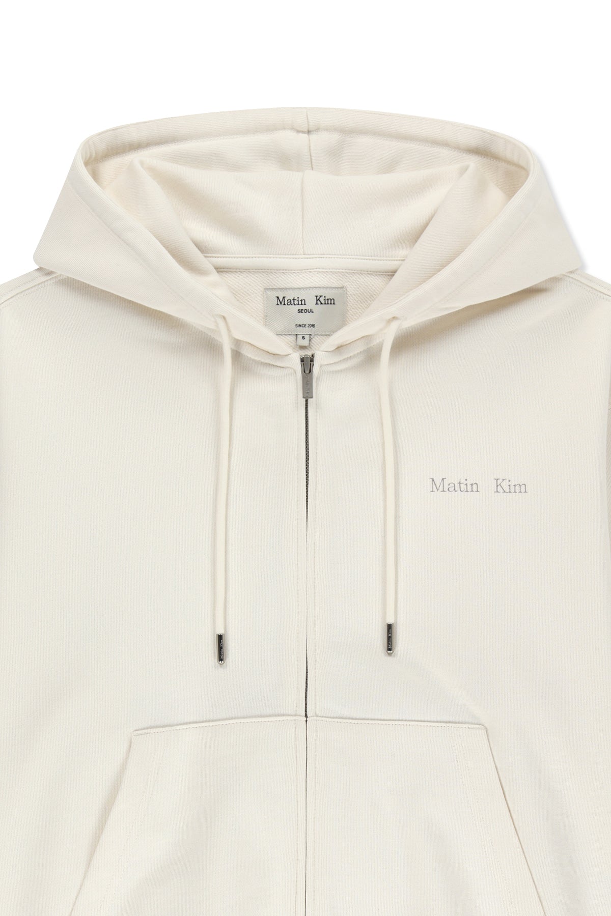 matinkim BACK LOGO ESSENTIAL HOODY ZIP UP IN IVORY
