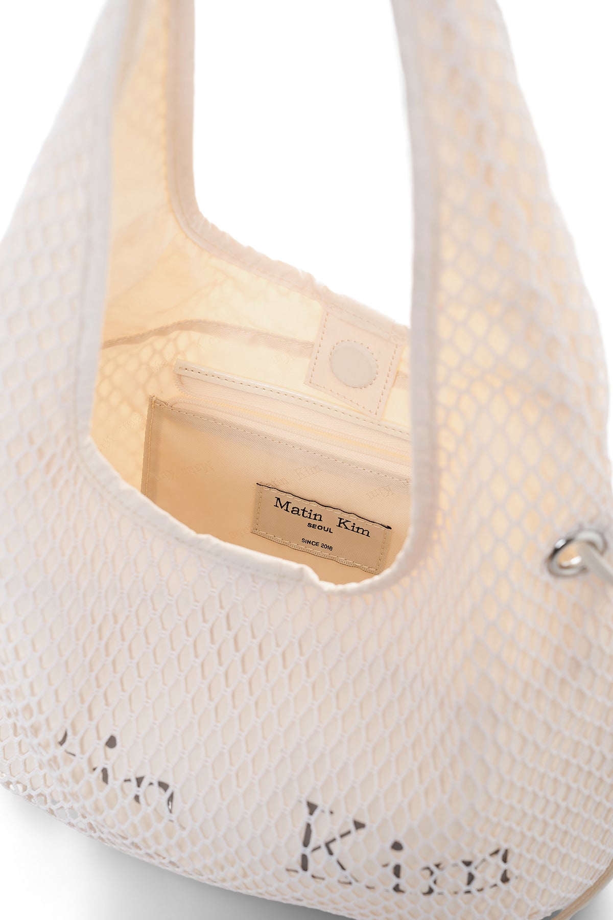 matinkim SIDE STRAP MESH MINI TOTE BAG IN IVORY