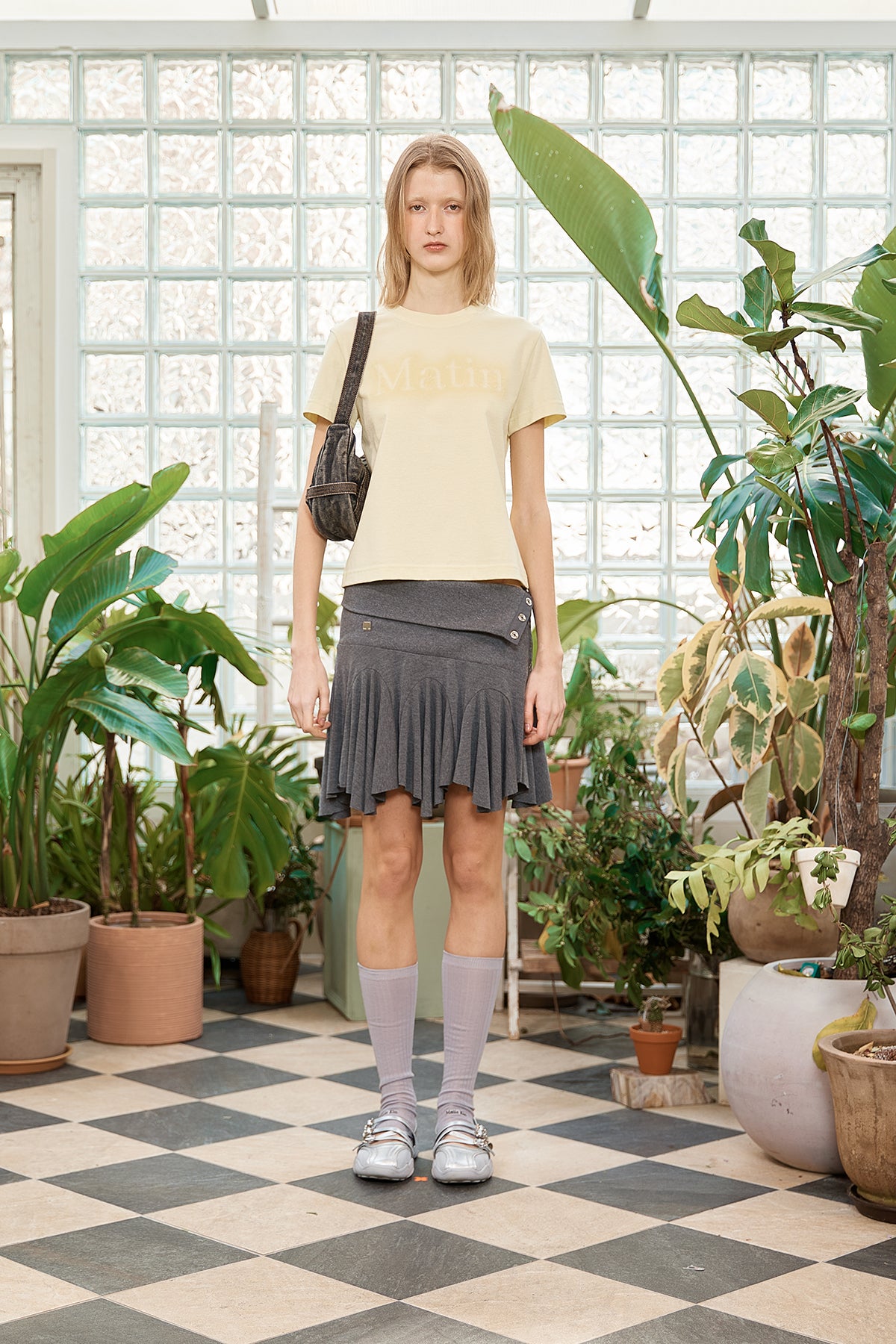 matinkim UNBALANCE FLARE FOLDING SKIRT IN CHARCOAL