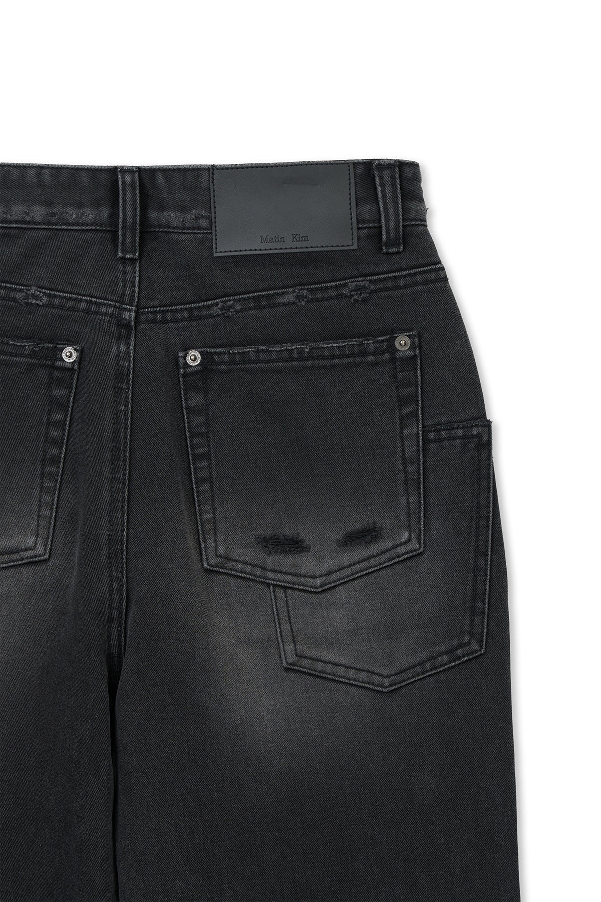 matinkim BACK POCKET PATCH DESTROYED DENIM PANTS IN BLACK
