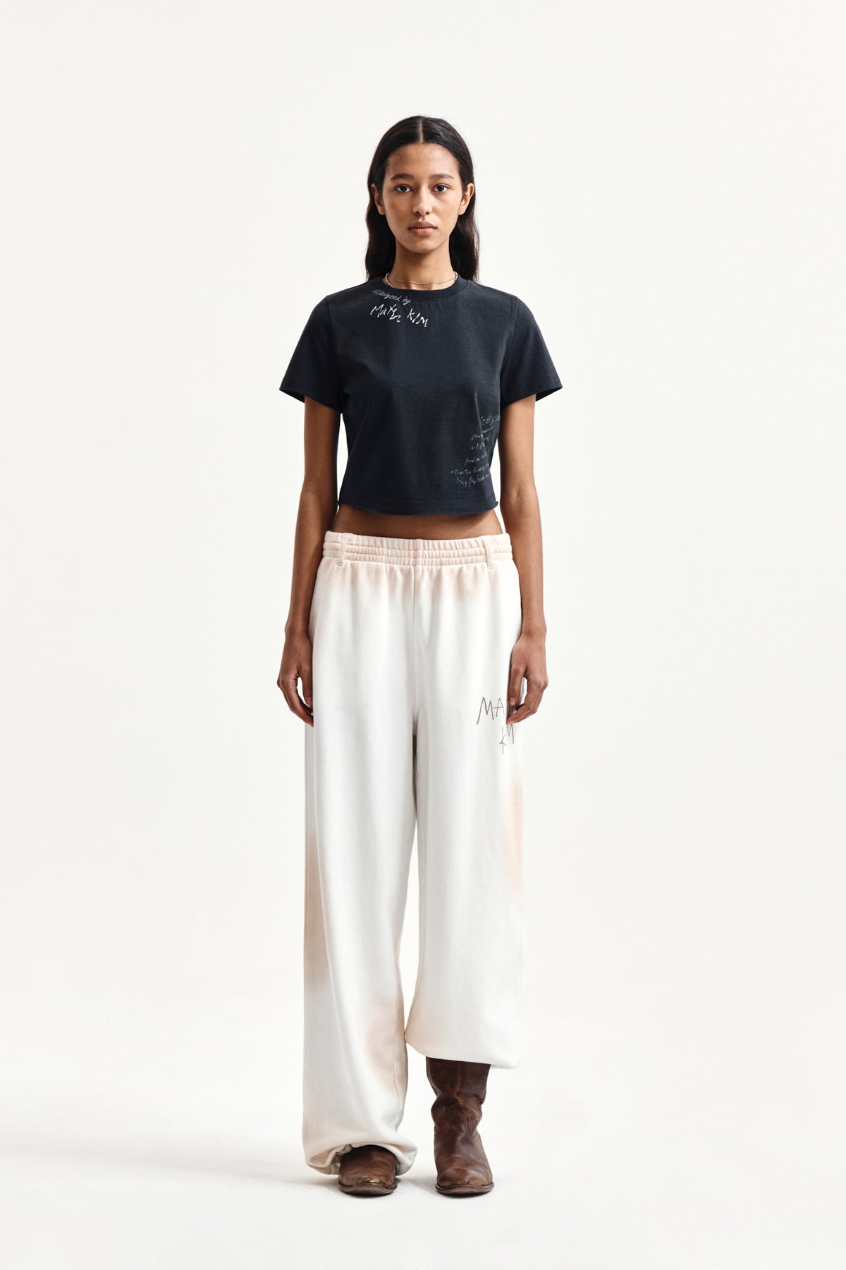 matinkim VINTAGE WASHED LOGO SWEATPANTS IN IVORY