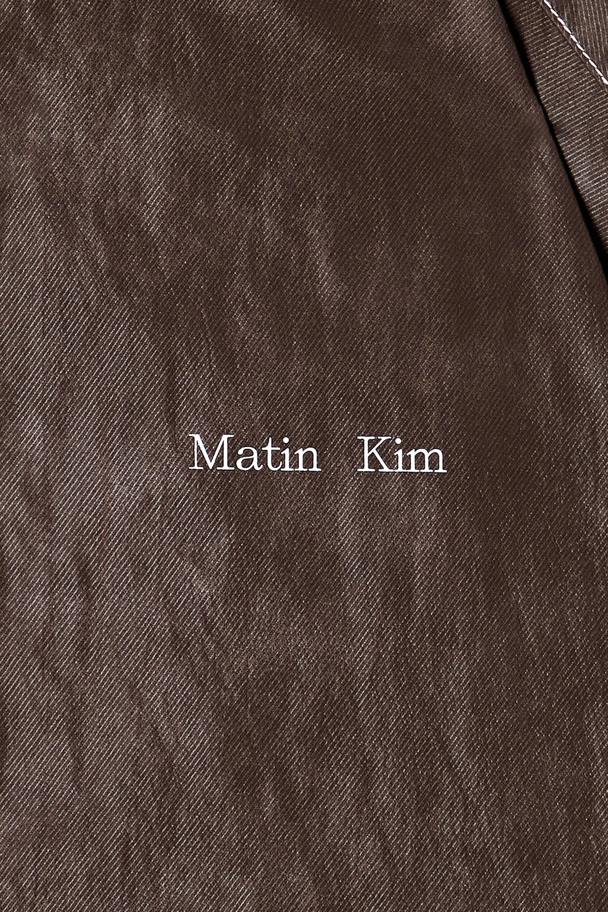 matinkim STITCH POINT HIGH NECK JUMPER IN BROWN