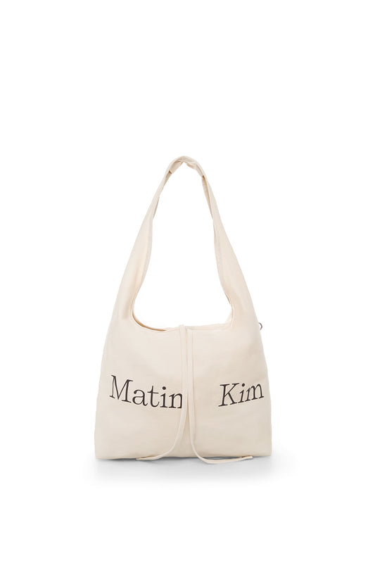 matinkim LOGO POINT ROUND ECOBAG IN IVORY