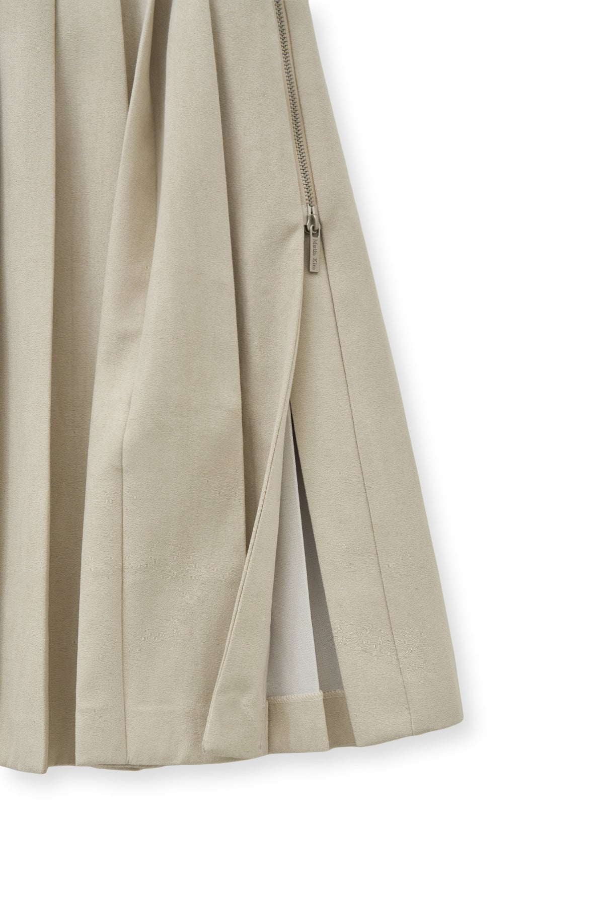 matinkim SIDE ZIPPER PLEATS MIDI SKIRT IN LIGHT BEIGE