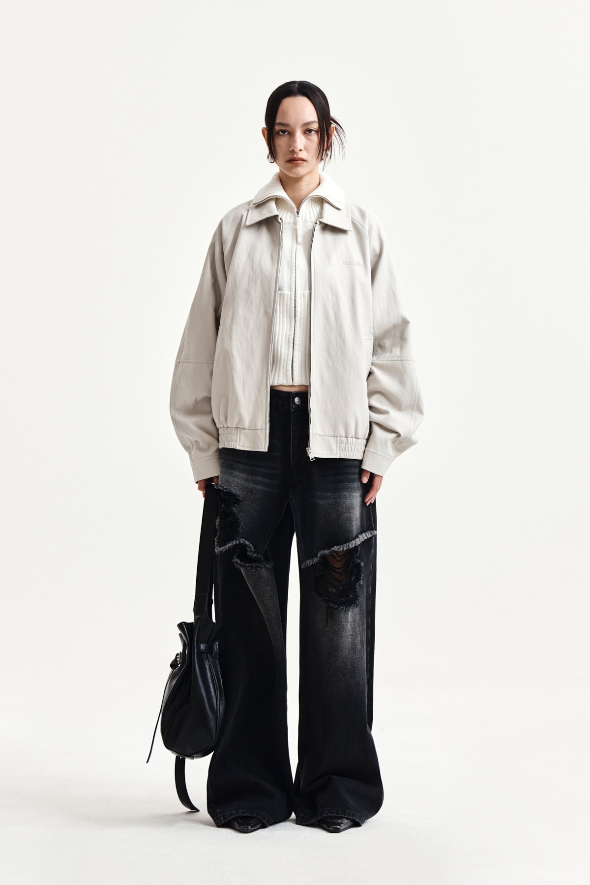 matinkim FRONT LAYERED DISTRESSED DENIM PANTS IN BLACK