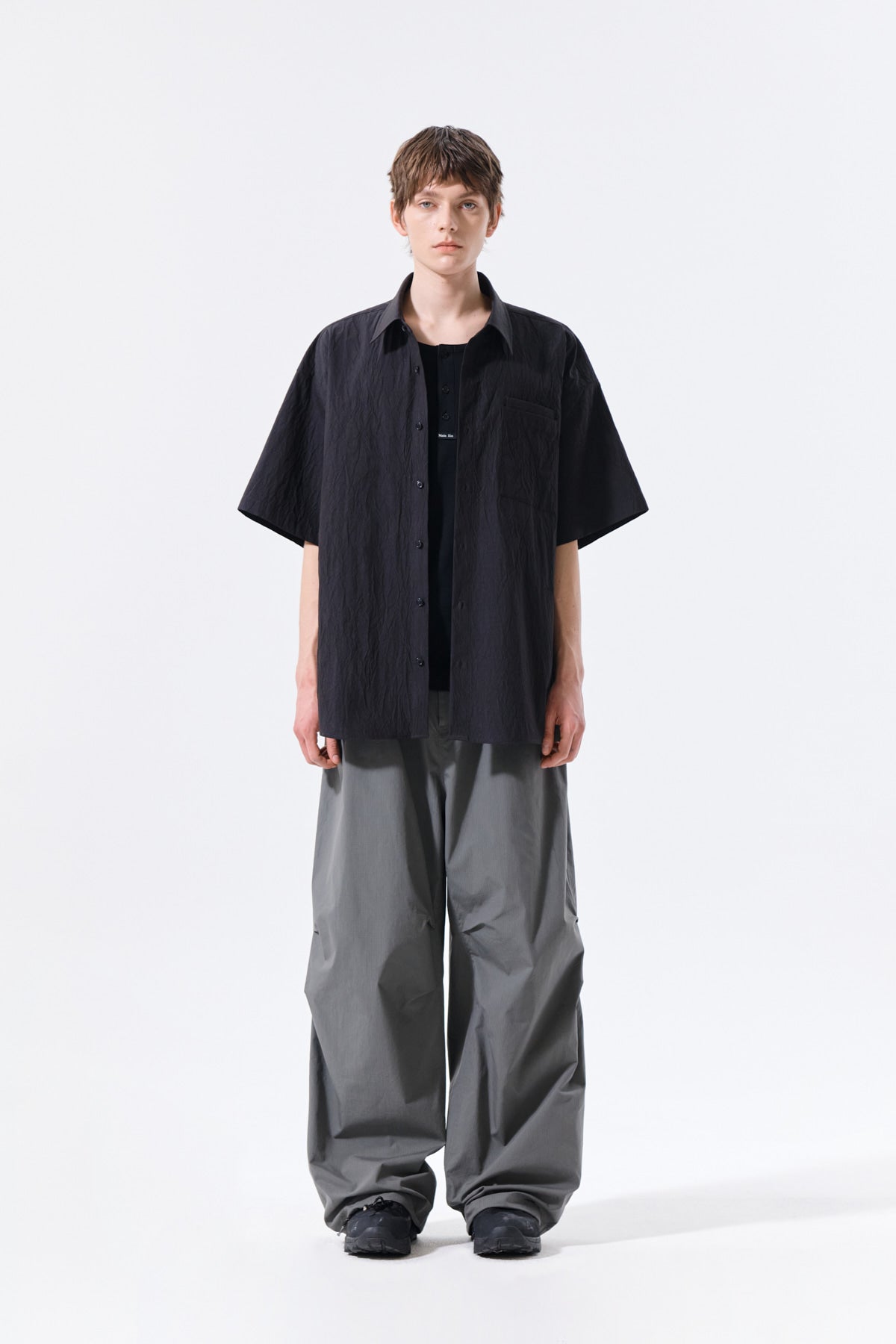 matinkim STRAP BELTED PANTS FOR MEN IN CHARCOAL