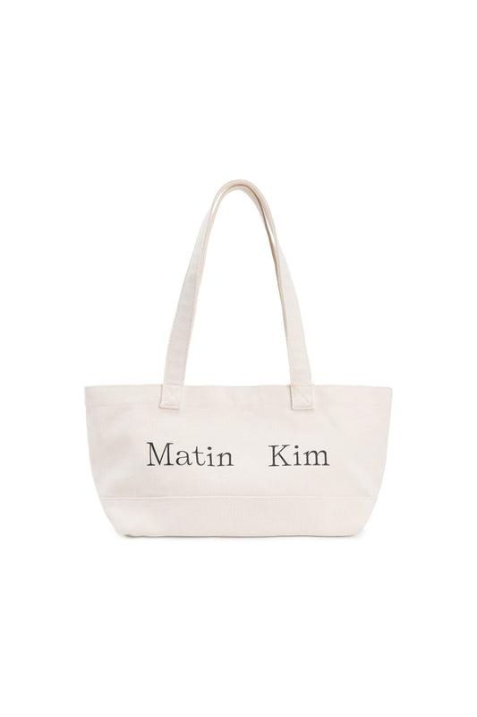 matinkim MATIN LOGO CANVAS WIDE SHOULDER BAG IN IVORY