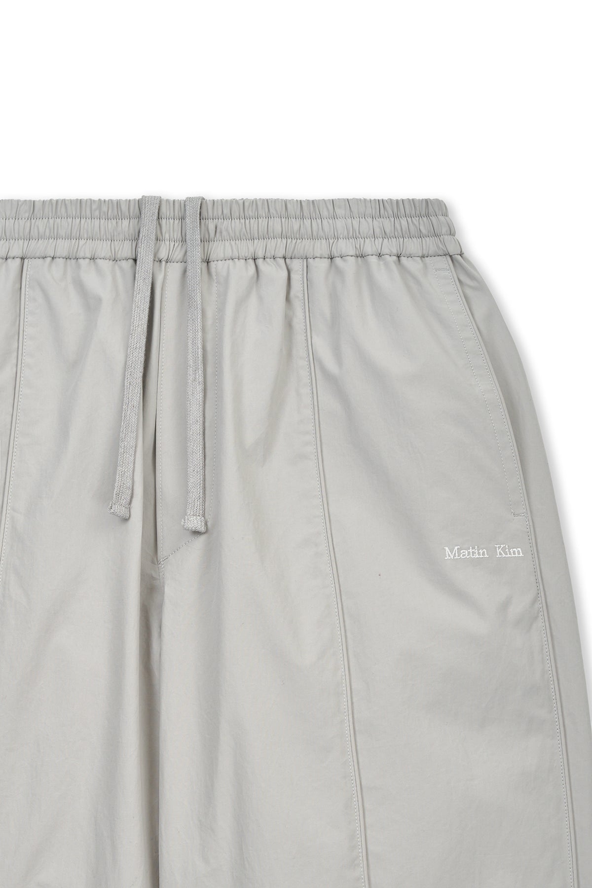 matinkim MULTI PANEL WIDE PANTS IN LIGHT GREY