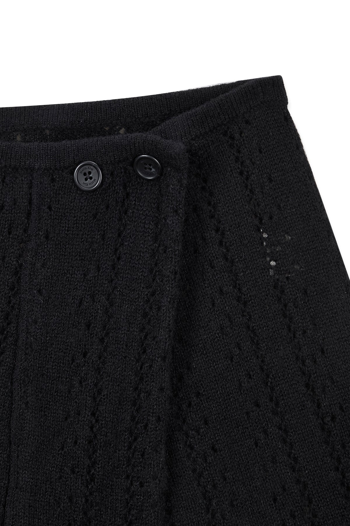 matinkim PUNCHING WRAP MINI SKIRT IN BLACK