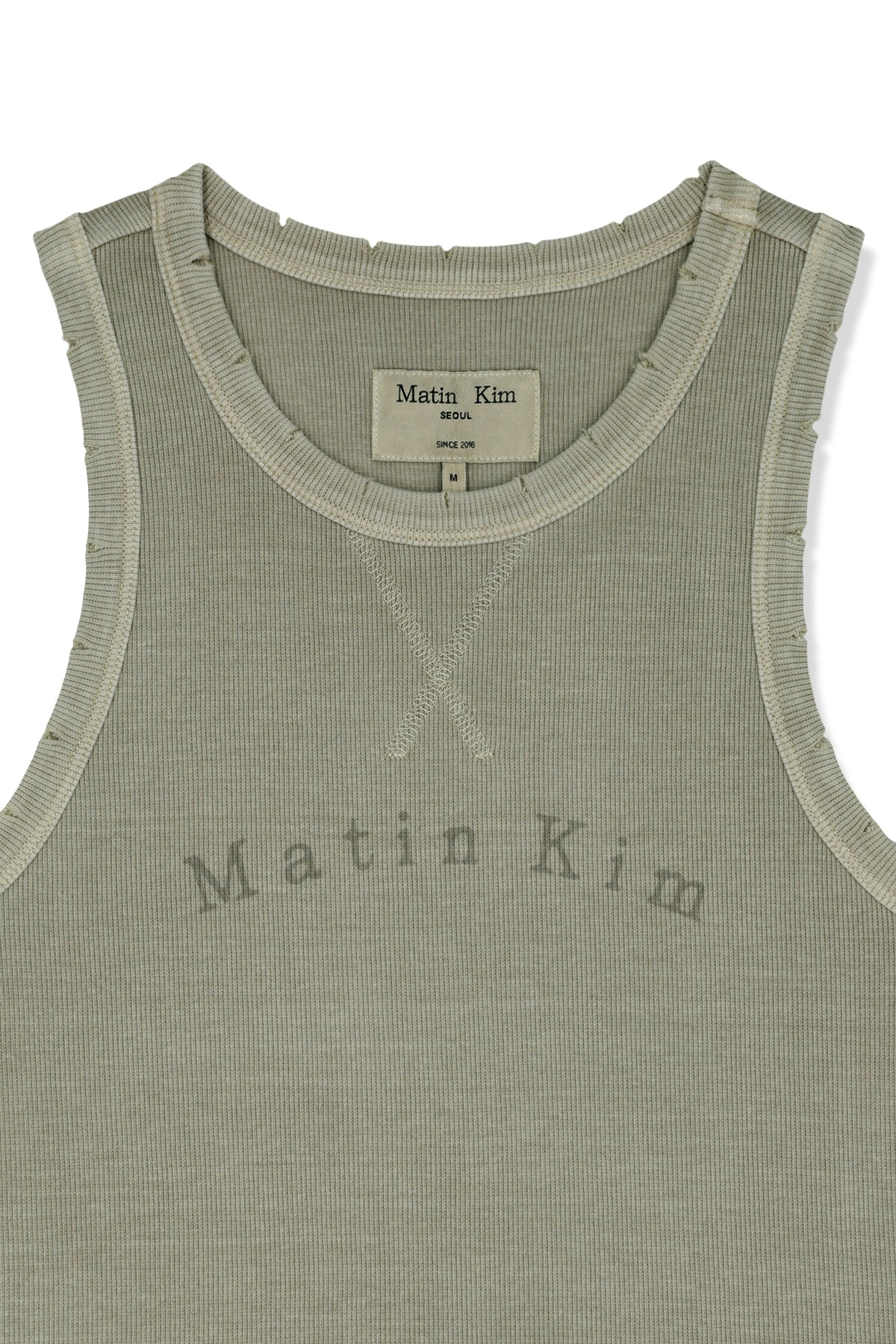 matinkim DISTRESSED SLEEVELESS LOGO TOP IN BEIGE
