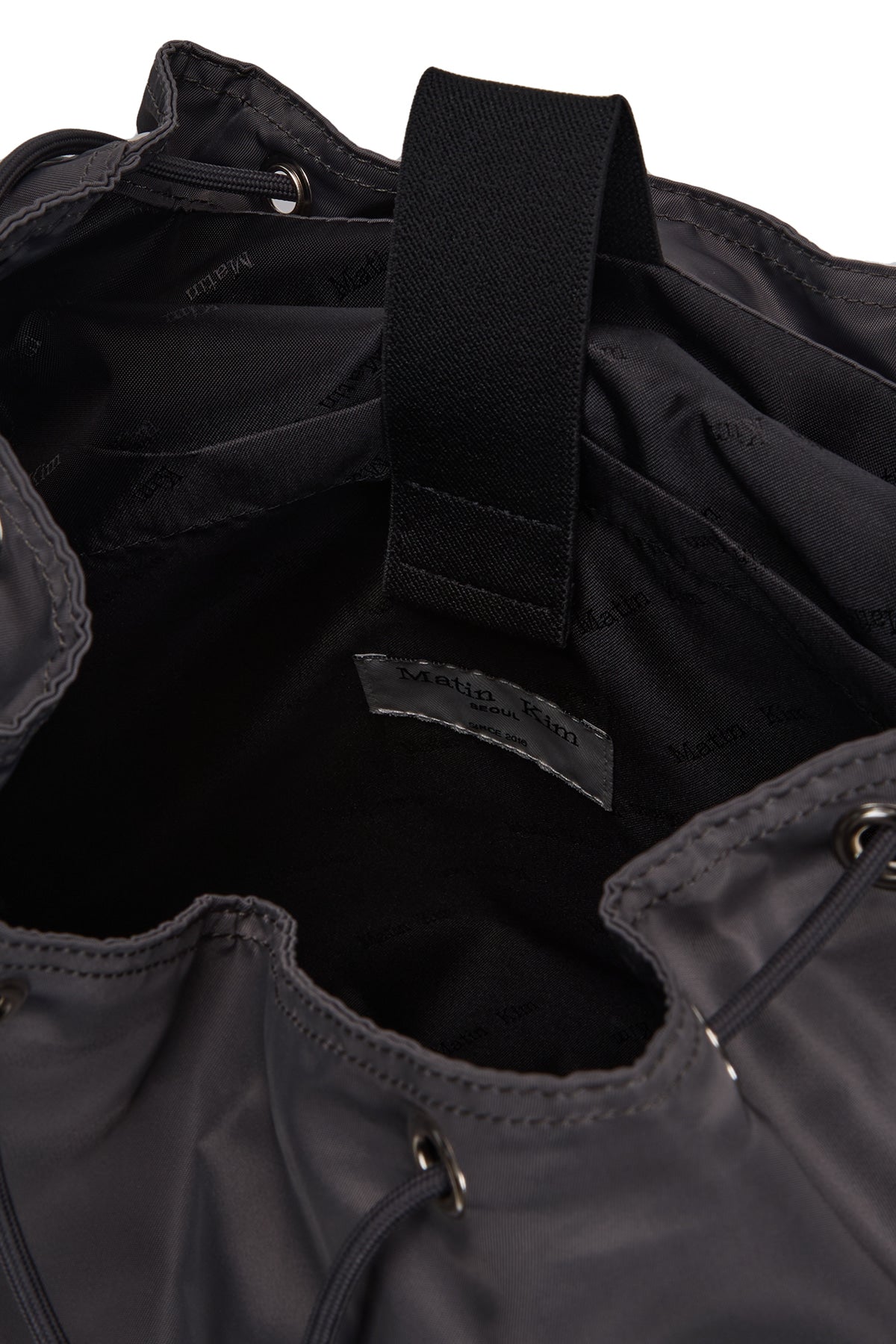 matinkim MATIN POCKET UTILITY LARGE BACK PACK IN CHARCOAL