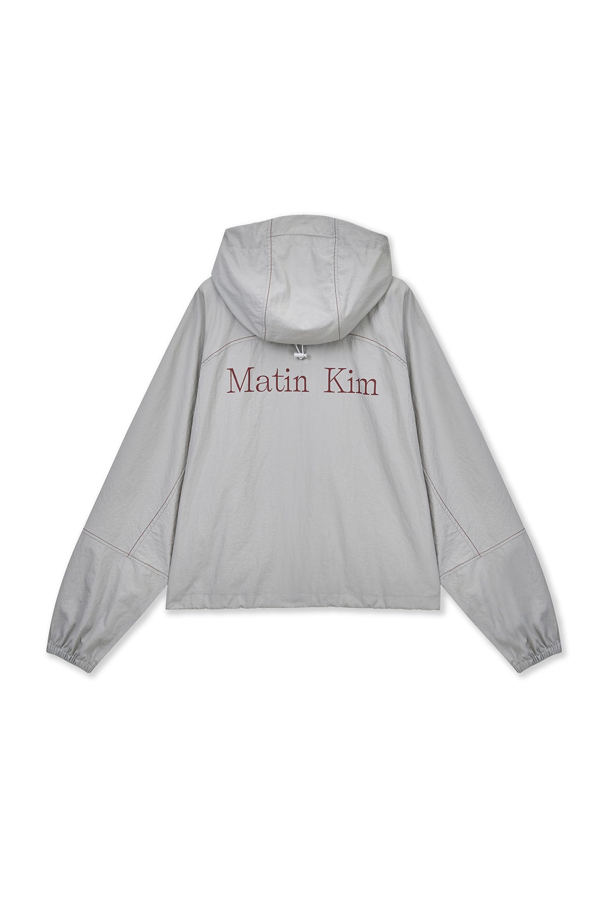 matinkim CROPPED BACK LOGO HOODY WIND BREAKER IN LIGHT BEIGE
