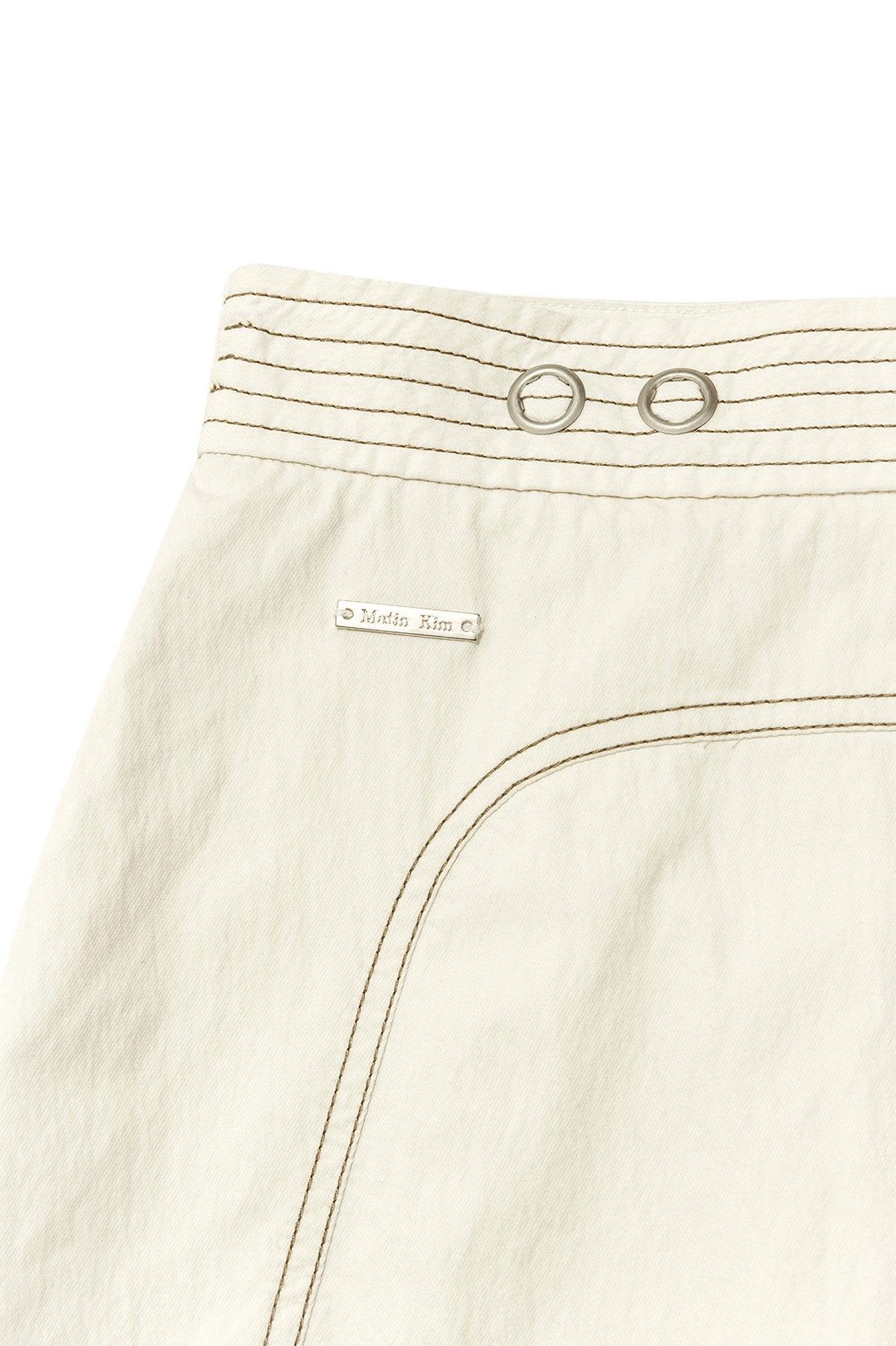 matinkim STITCH POINT BELTED WRAP SKIRT IN LIGHT BEIGE