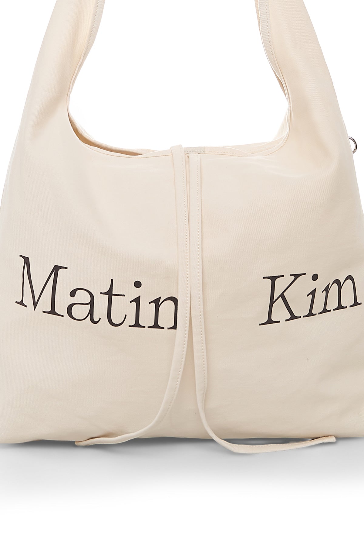 matinkim LOGO POINT ROUND ECOBAG IN IVORY