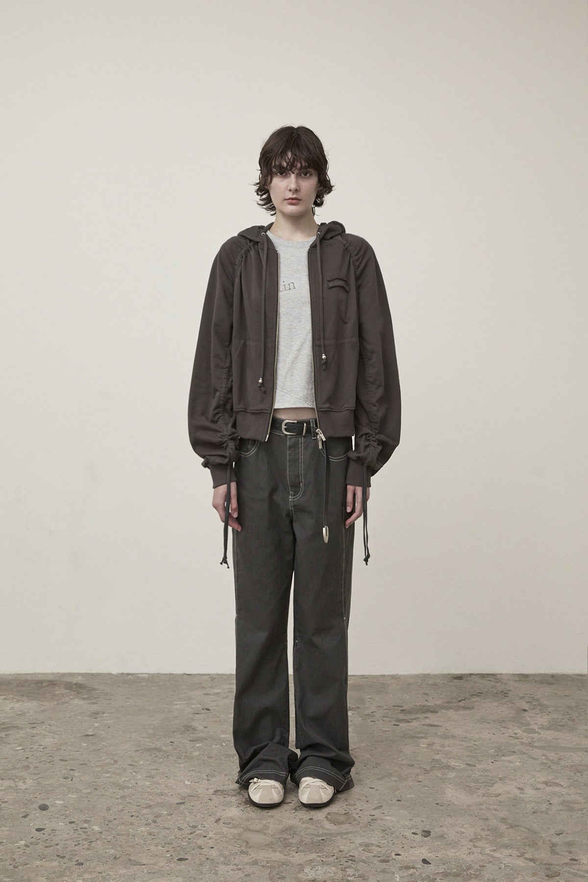matinkim SLEEVE STRING DETAIL HOODY ZIP UP IN CHARCOAL