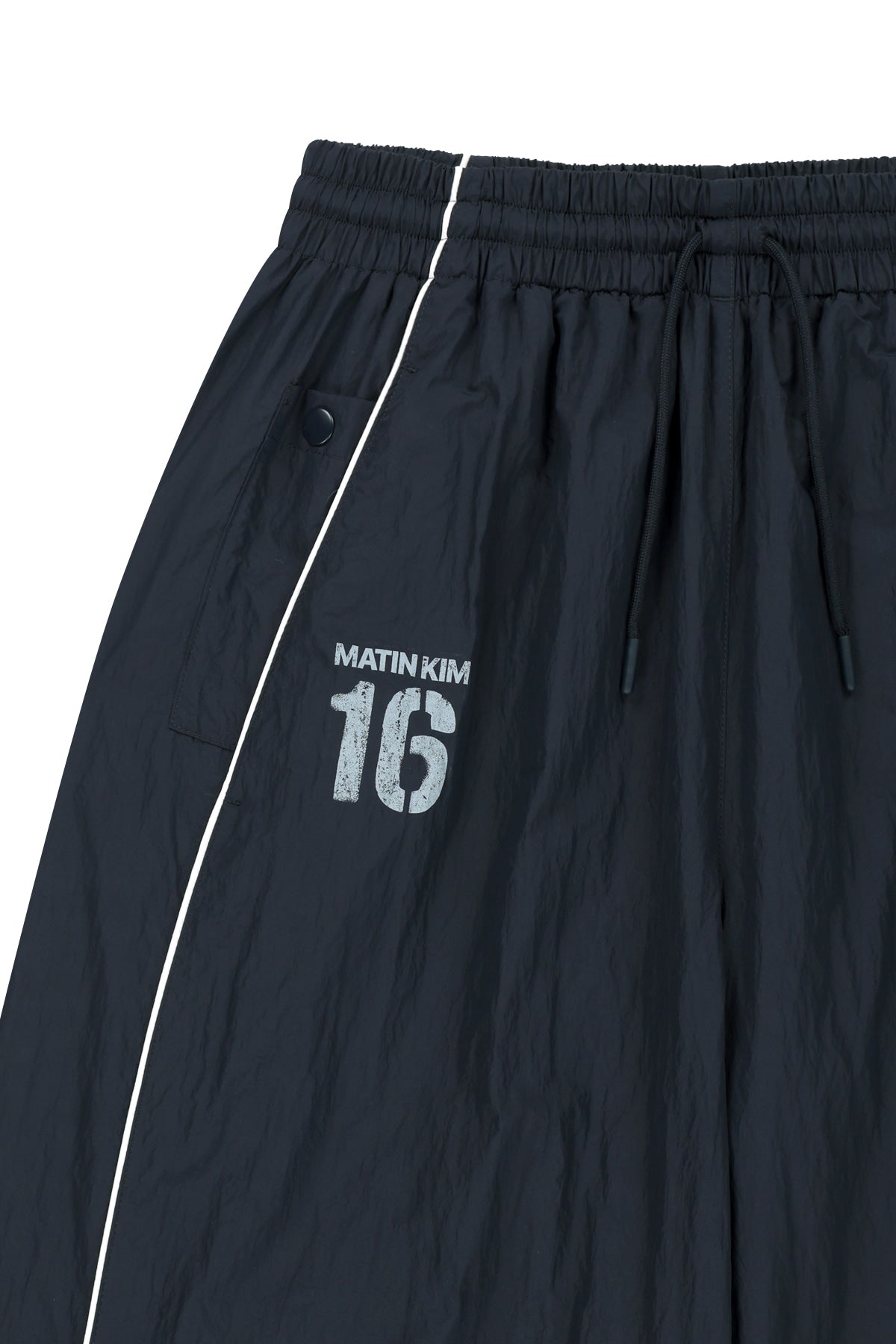 matinkim MATIN 16 LOGO TRACK PANTS IN NAVY