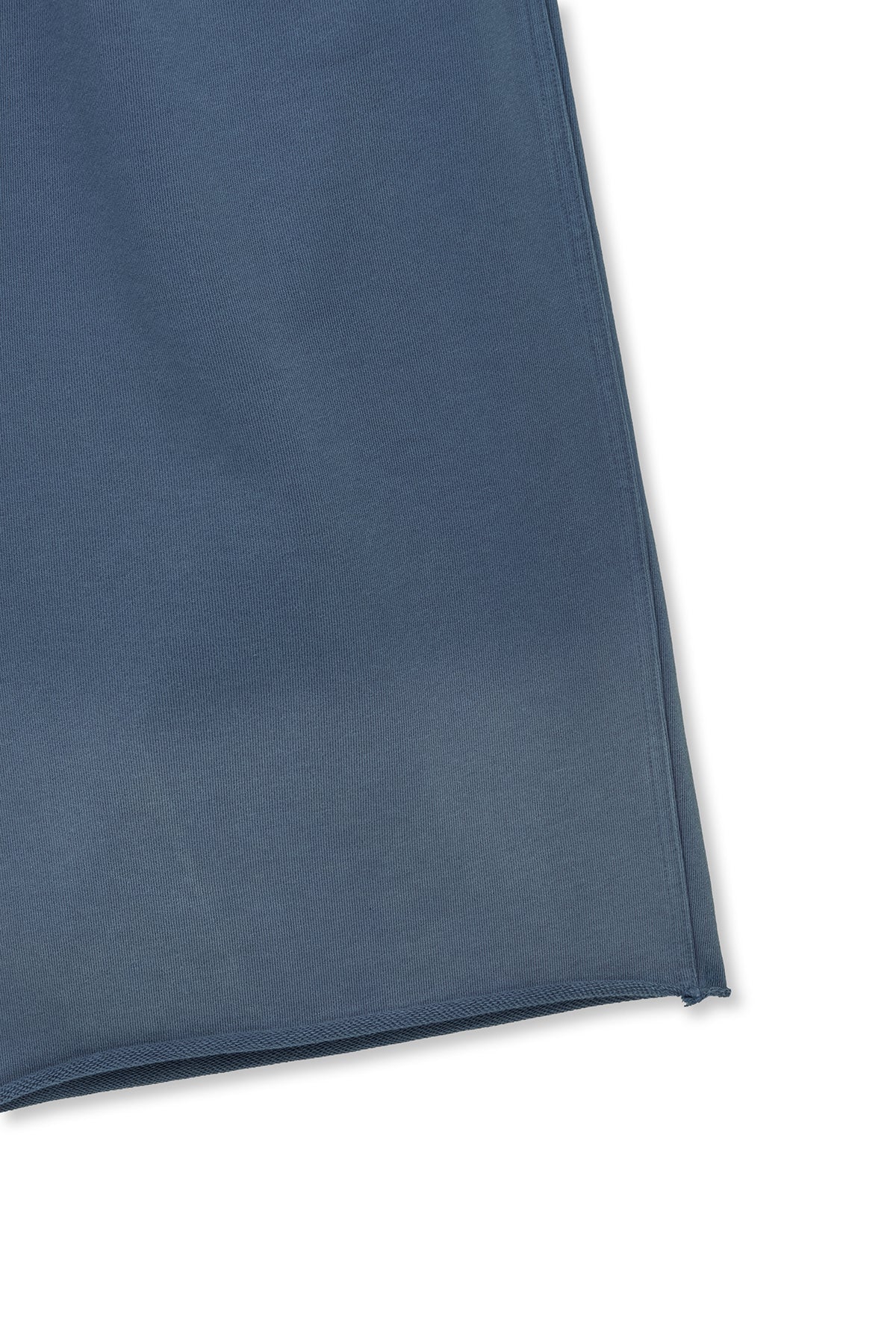 matinkim VINTAGE WASHED BACK LOGO BERMUDA SWEATPANTS IN SMOKE BLUE