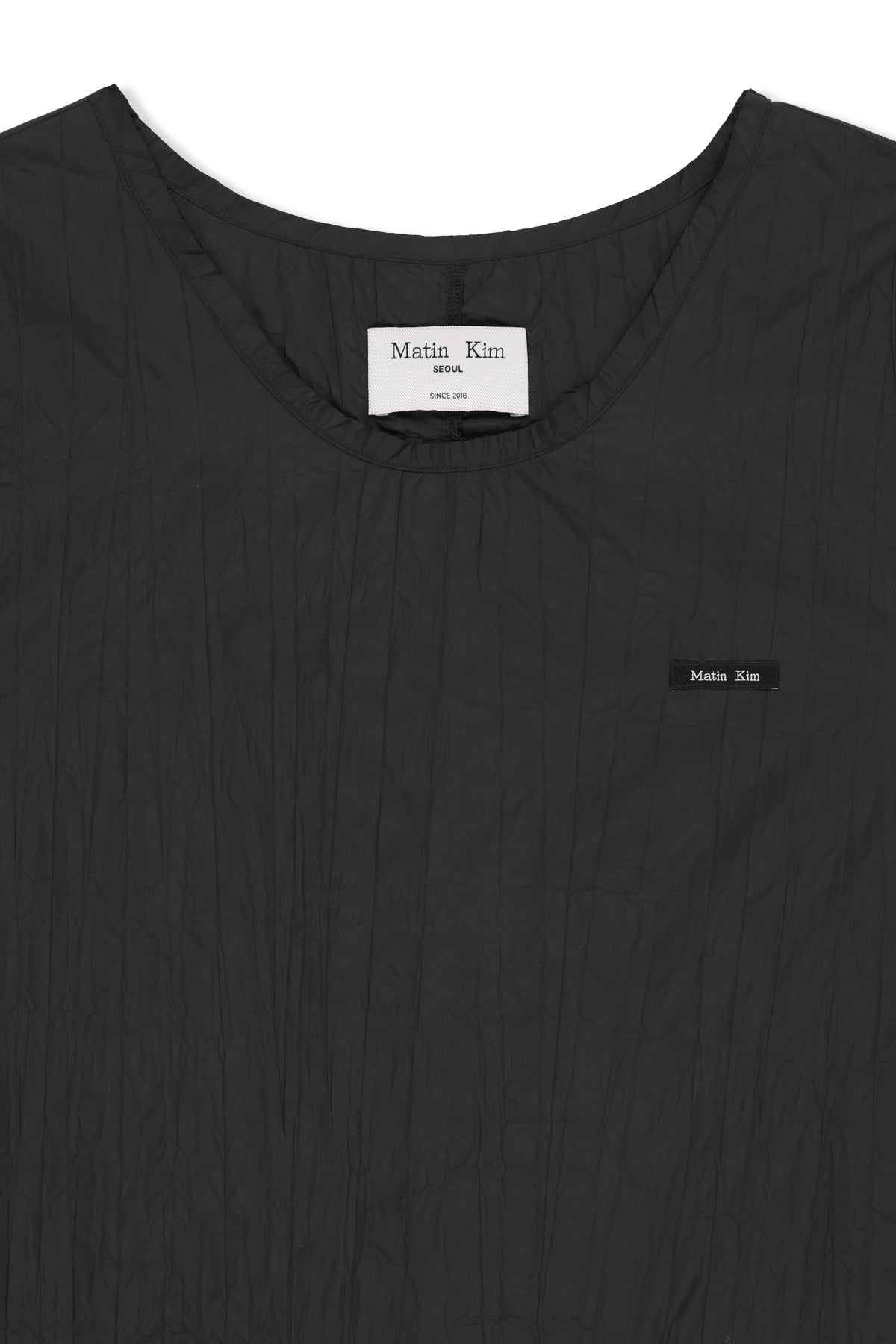matinkim RAW EDGE PATCH POCKET SLEEVELESS DRESS IN BLACK