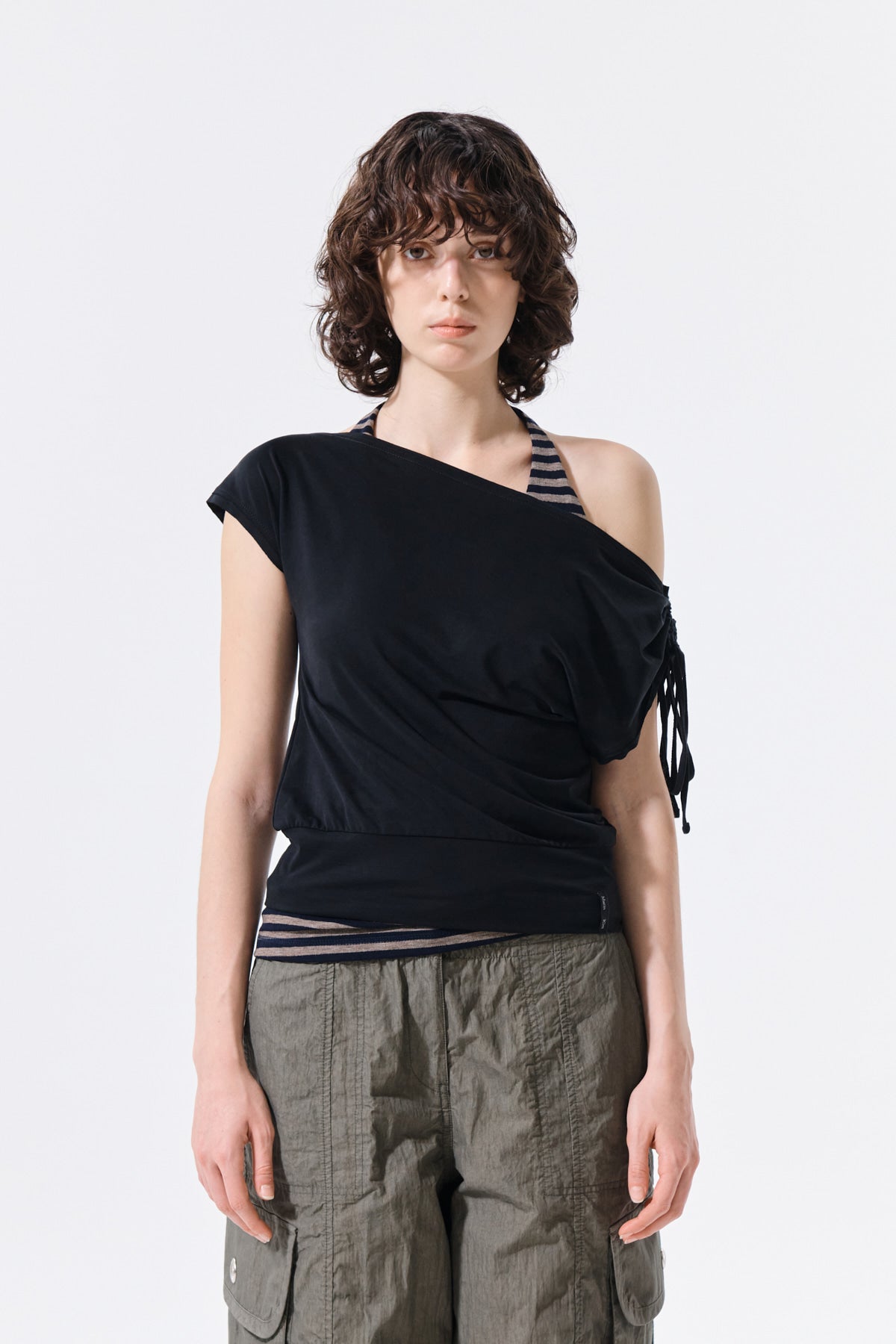 matinkim DRAPED ASYMMETRIC SLEEVELESS TOP IN BLACK